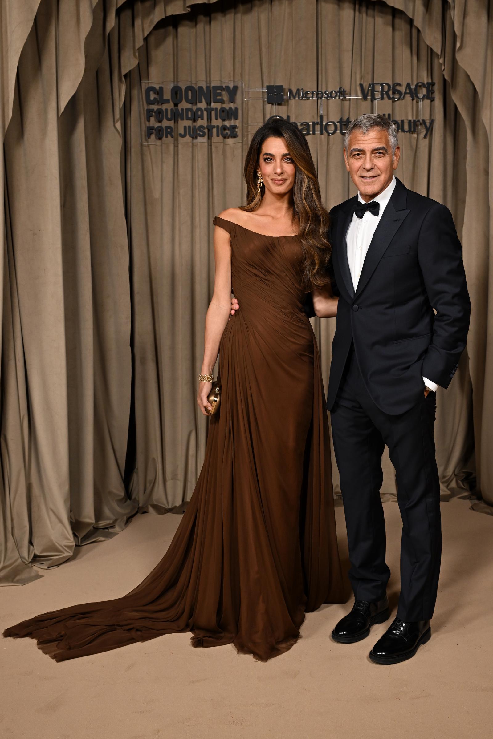 Amal Clooney and George Clooney attend the Clooney Foundation for Justice's The Albies at the Natural History Museum in London, England on October 3, 2025 | Source: Getty Images