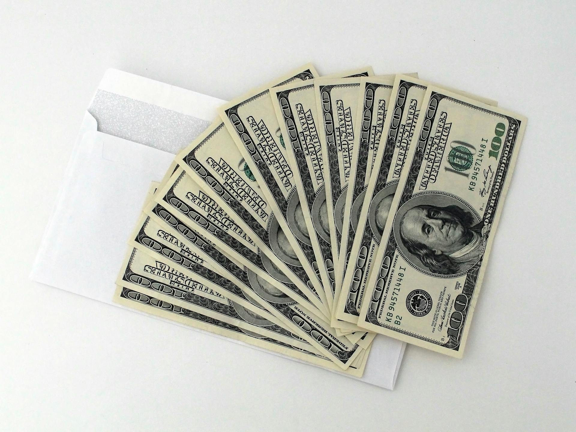 Dollar bills in an envelope | Source: Pexels