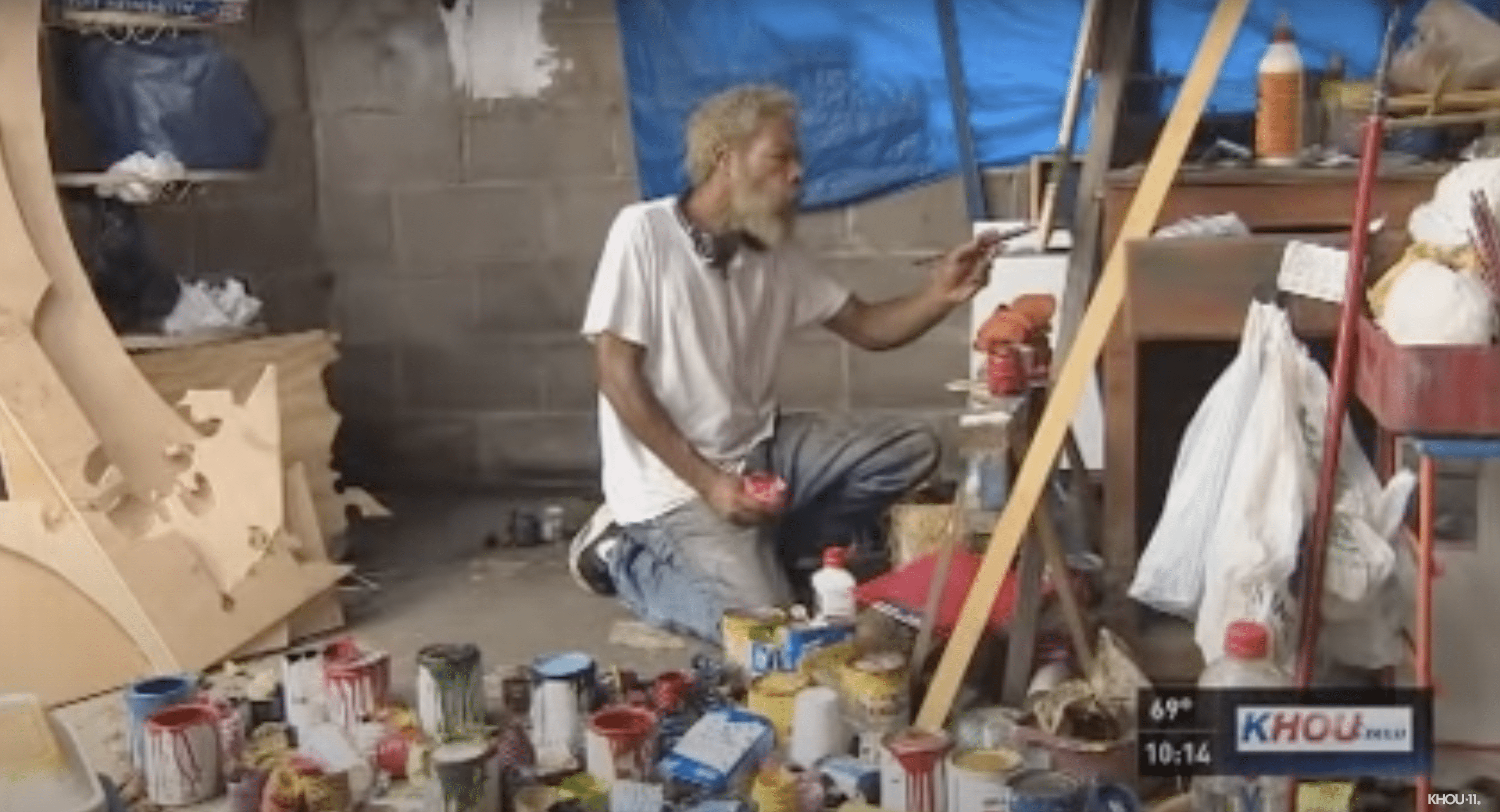 Rudolph pictured painting. | Source: youtube.com/KHOU 11