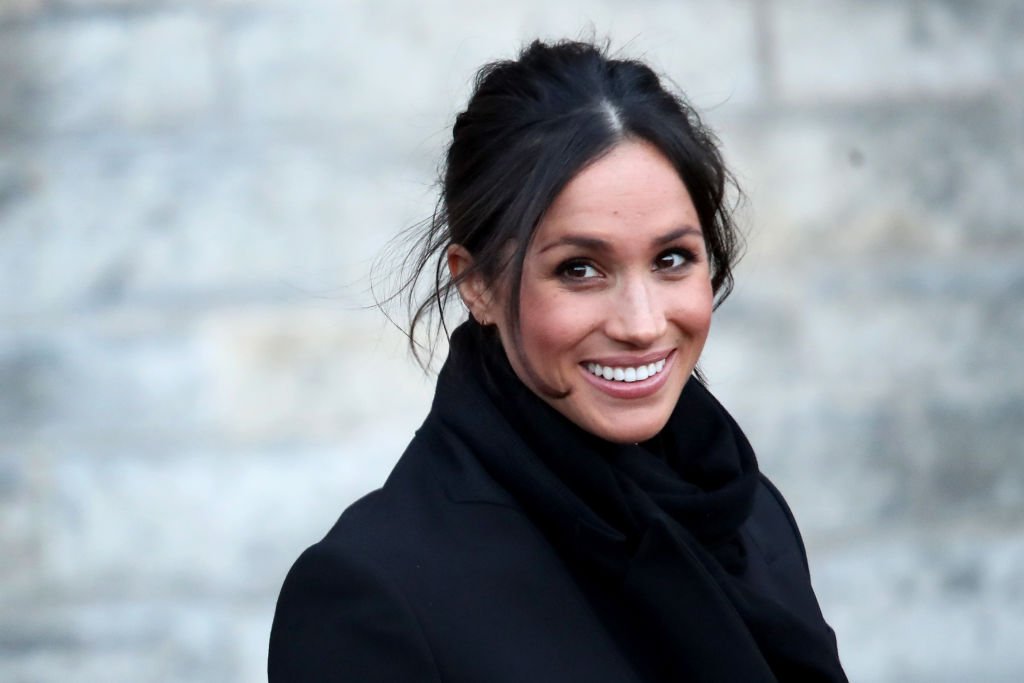  Meghan Markle departs from a walkabout at Cardiff Castle | Chris Jackson/Getty Images