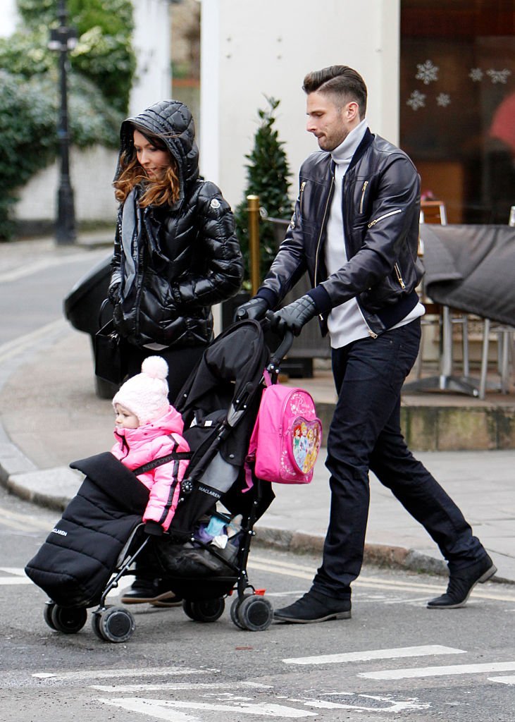 Olivier et Jennifer Giroud lors d'une sortie en famille en 2015 à Londres. l Source : Getty Images