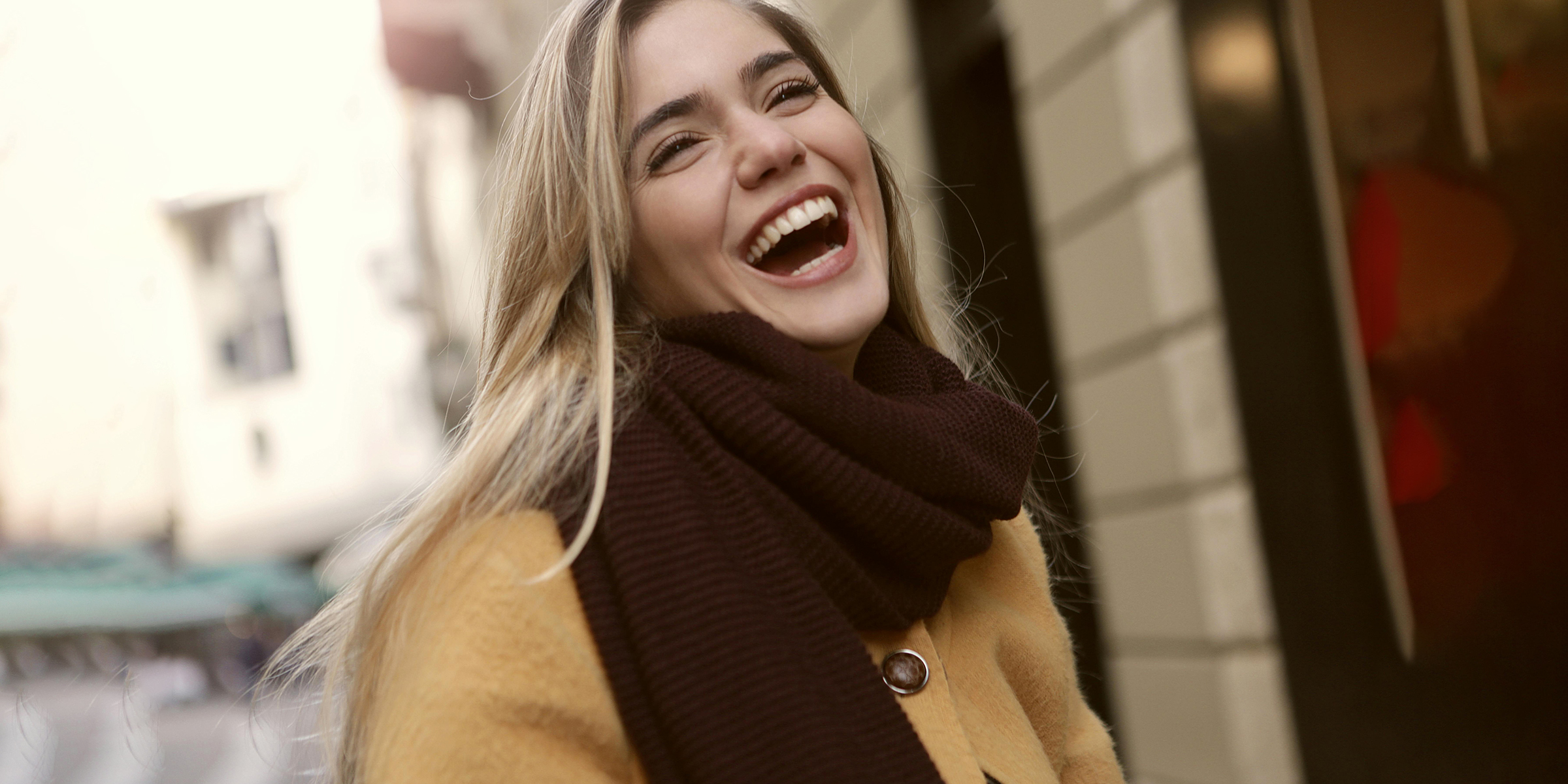 A woman laughing | Source: Pexels