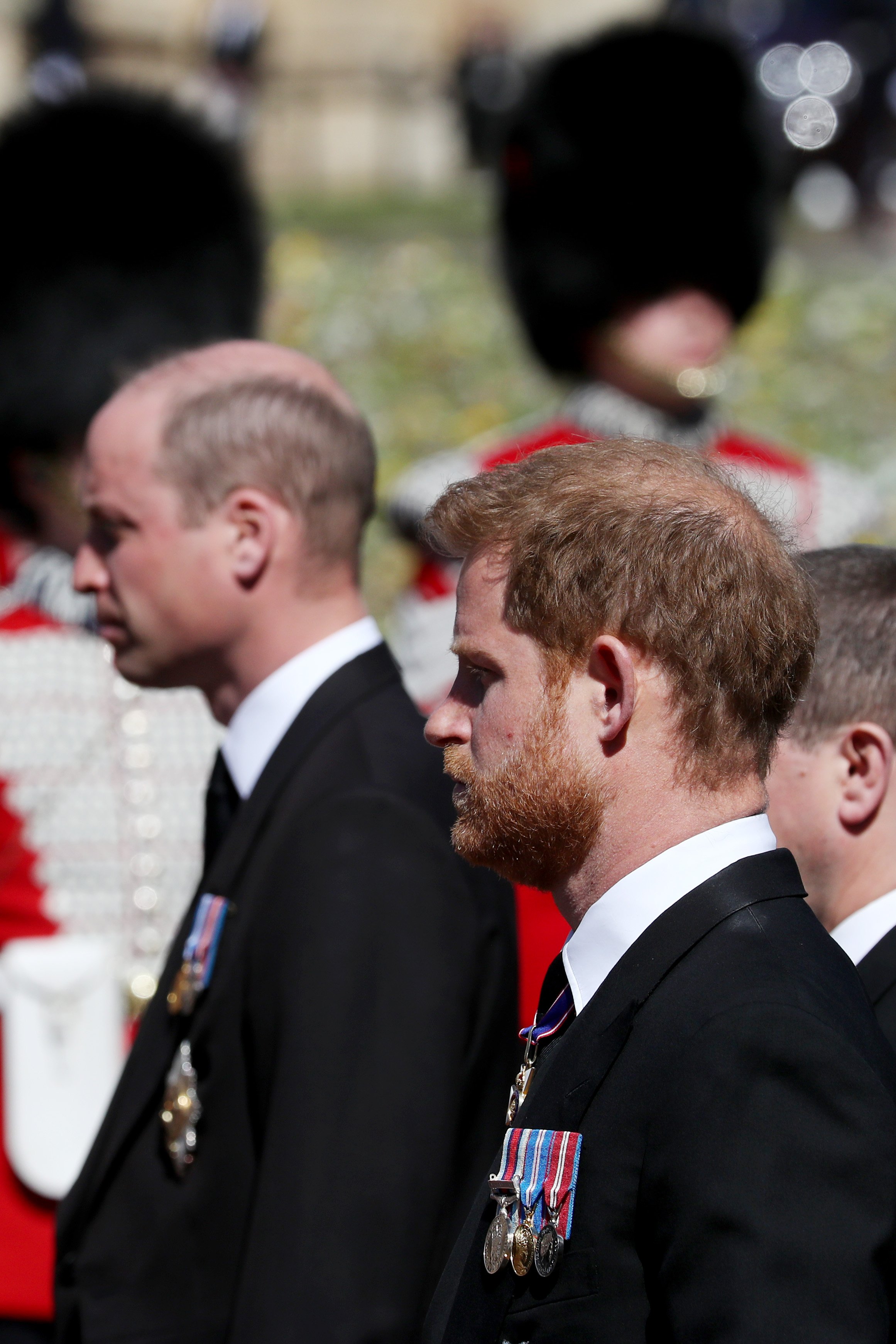 Prince William, Duke of Cambridge and Prince Harry, Duke of Sussex during the Ceremonial Procession during the funeral of Prince Philip, Duke of Edinburgh at Windsor Castle on April 17, 2021 in Windsor, England | Source: Getty Images