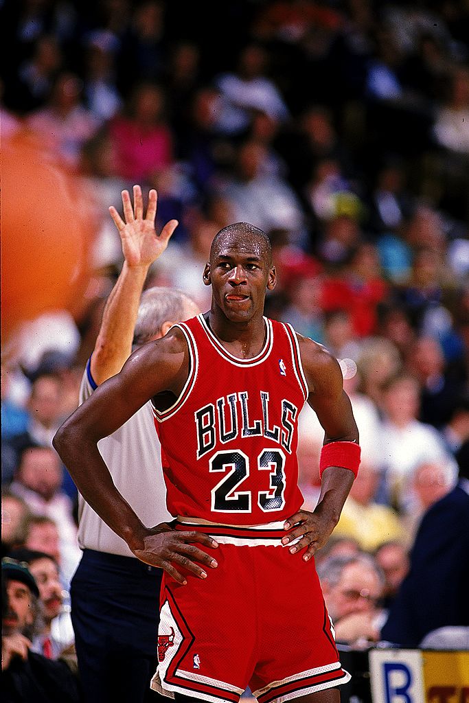 Michael Jordan #23 of the Chicago Bulls looks on during the game | Photo: Getty Images