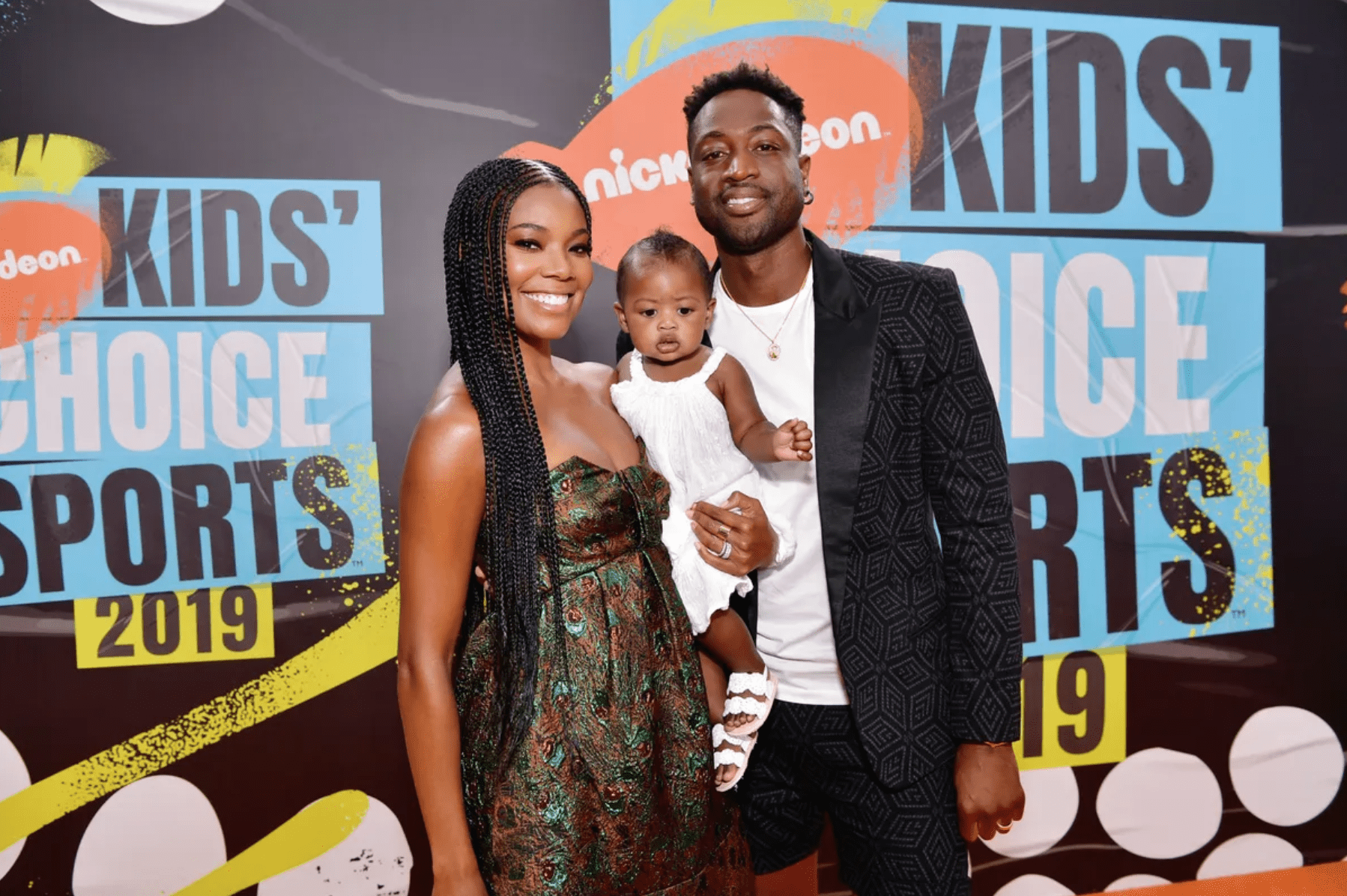 Gabrielle Union and Dwyane Wade with their daughter, Kaavia James, attending Nickelodeon Kids' Choice Sports 2019 on July 11, 2019. | Source: Getty Images