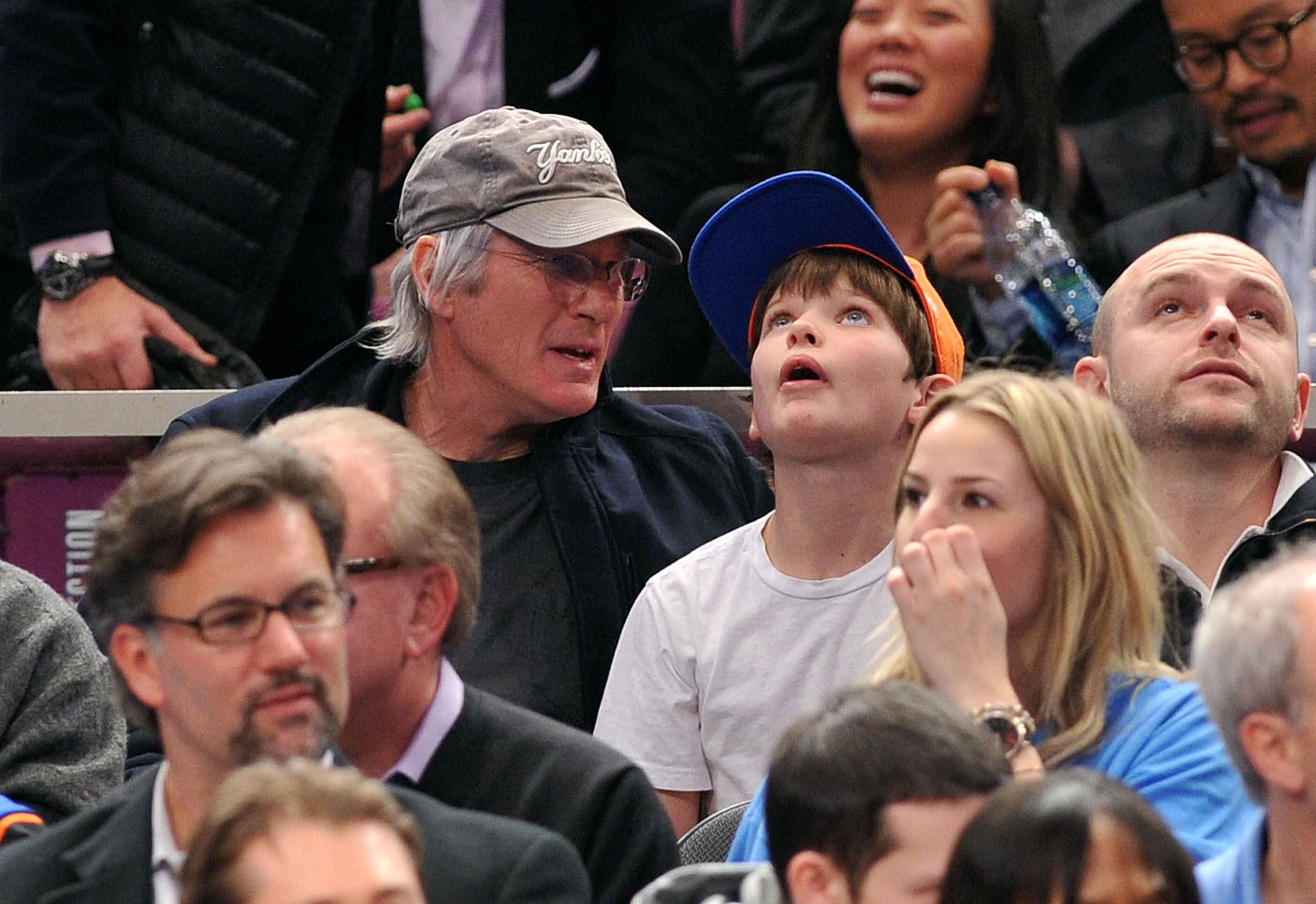 Richard Gere and Homer James Jigme Gere at a Utah Jazz vs New York Knicks game in New York City on March 7, 2011 | Source: Getty Images