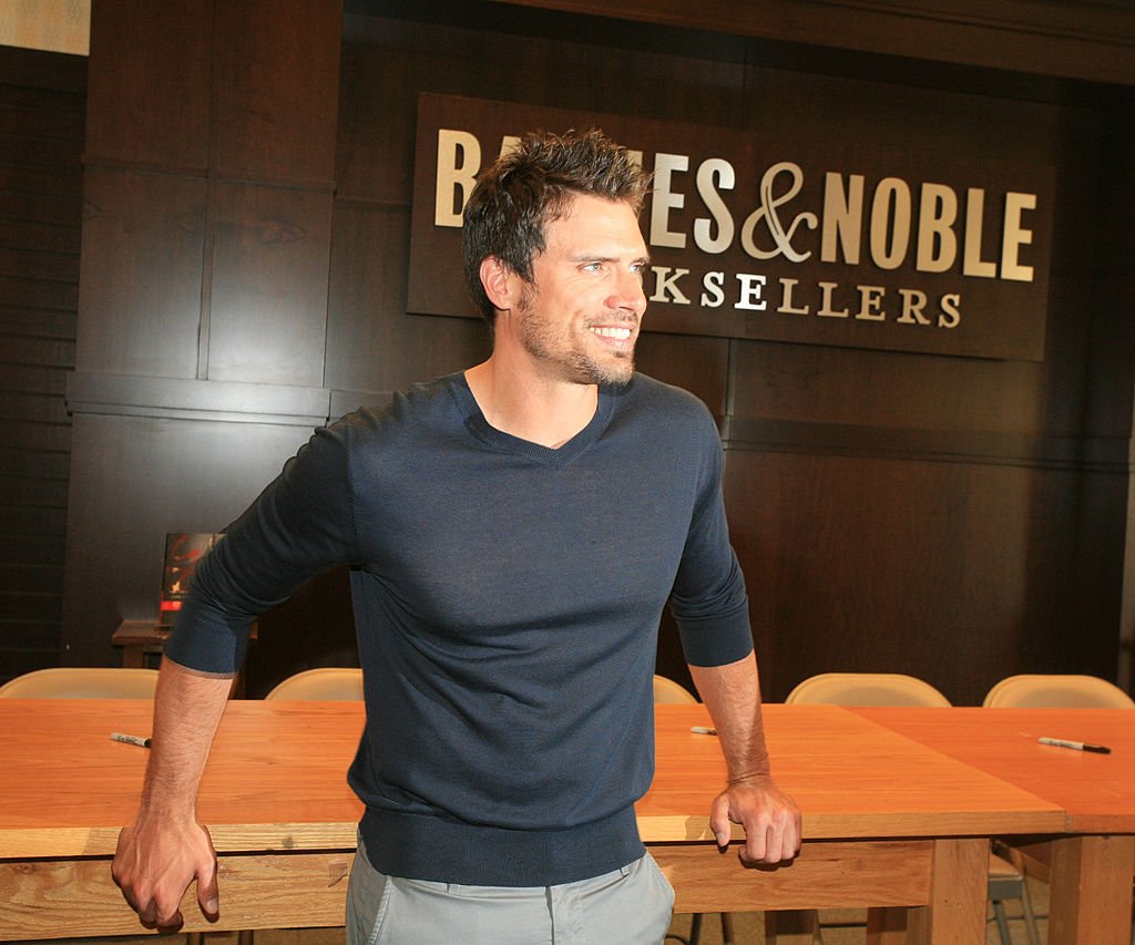 Joshua Morrow smiles during the book signing For "The young and restless life of William J.Bell" at Barnes & Noble bookstore on June 21, 2012 in Los Angeles, California. | Photo: Getty Images