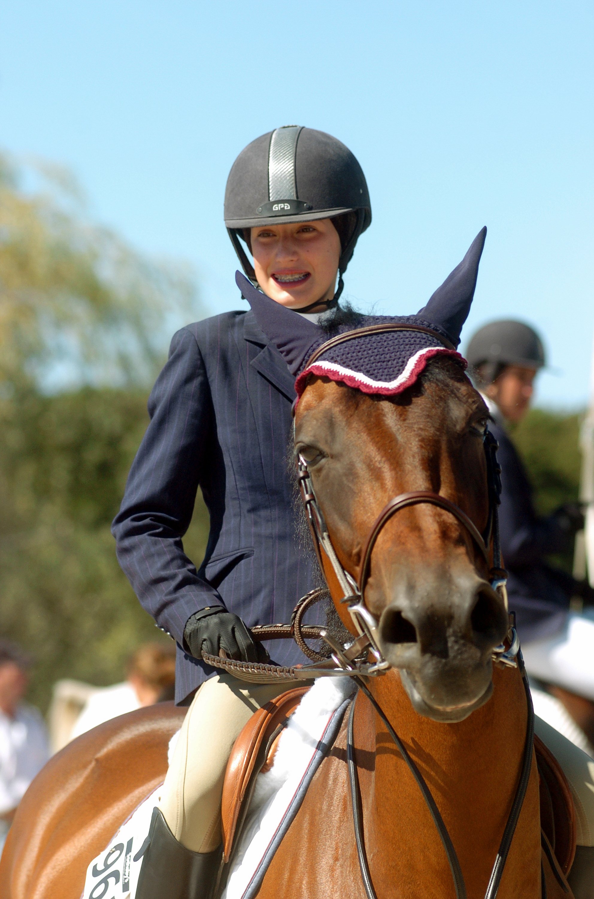 Jessica Springsteen grins as she rides her horse, Presto, during the 30th annual Hampton Classic Horse Show in Bridgehampton in 2005 | Source: Getty Images