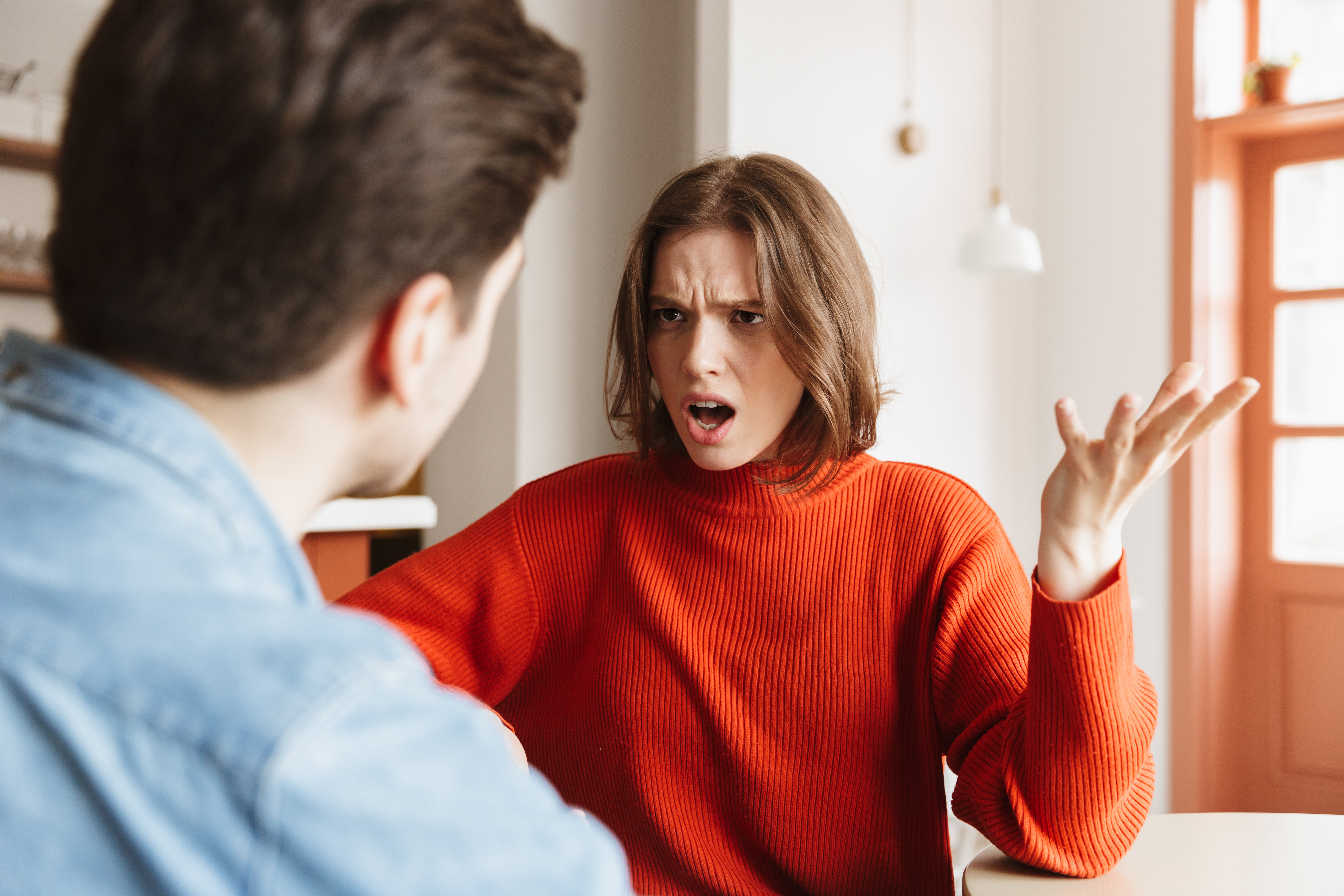 A woman becoming angry while arguing with her husband | Source: Getty Images