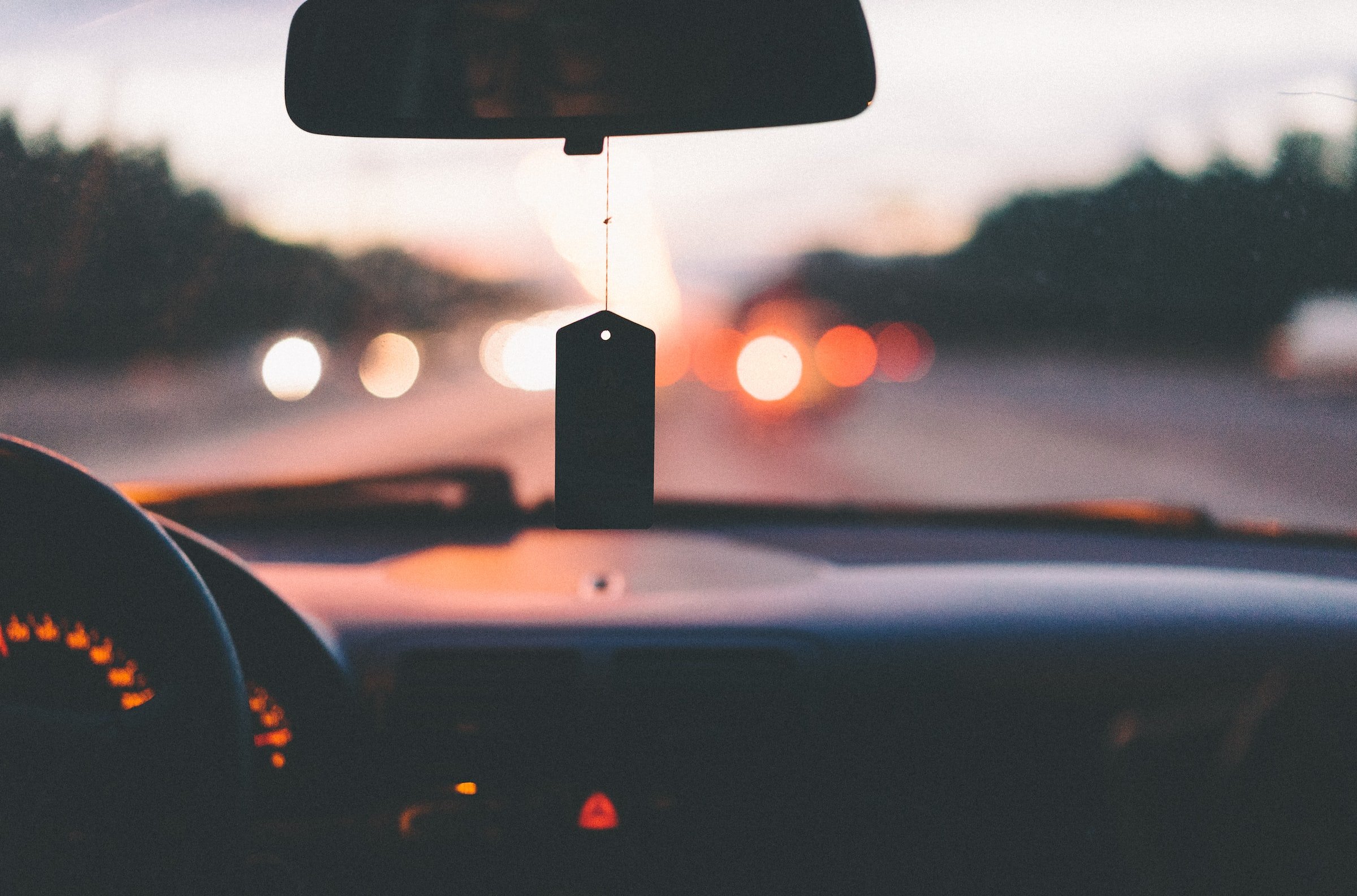 Close up of a car's dashboard and windscreen. | Source: Unsplash