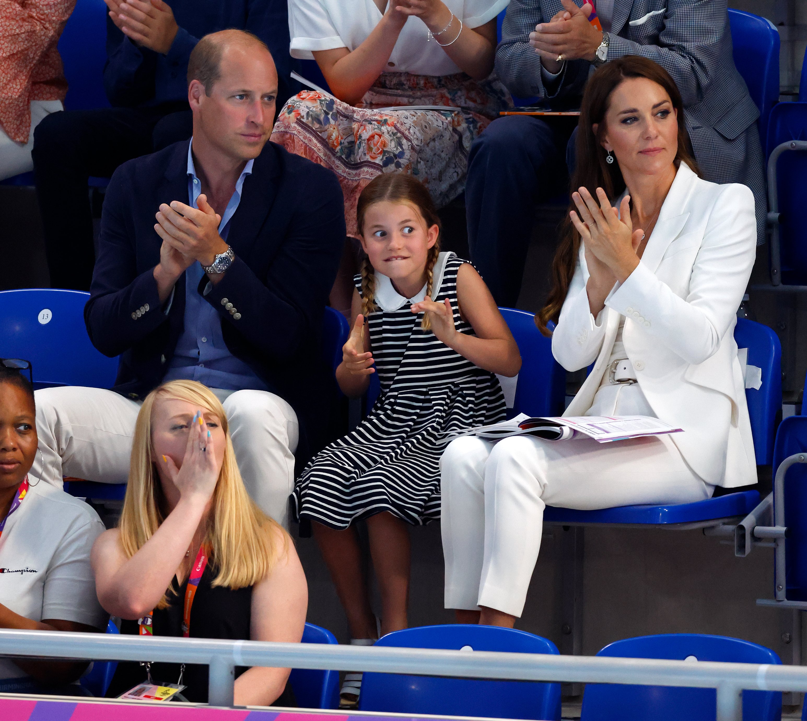 Prince William, Duke of Cambridge, Princess Charlotte of Cambridge and Catherine, Duchess of Cambridge watch the swimming competition at the Sandwell Aquatics Centre during the 2022 Commonwealth Games on August 2, 2022 in Birmingham, England | Source: Getty Images 