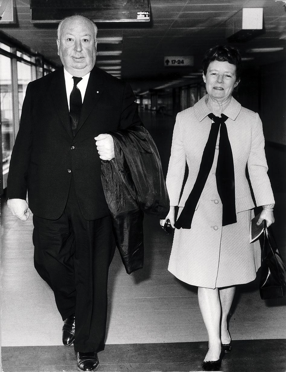 Alfred Hitchcock and Alma arrive at Heathrow Airport from Paris in September 1969. | Source: Getty Images
