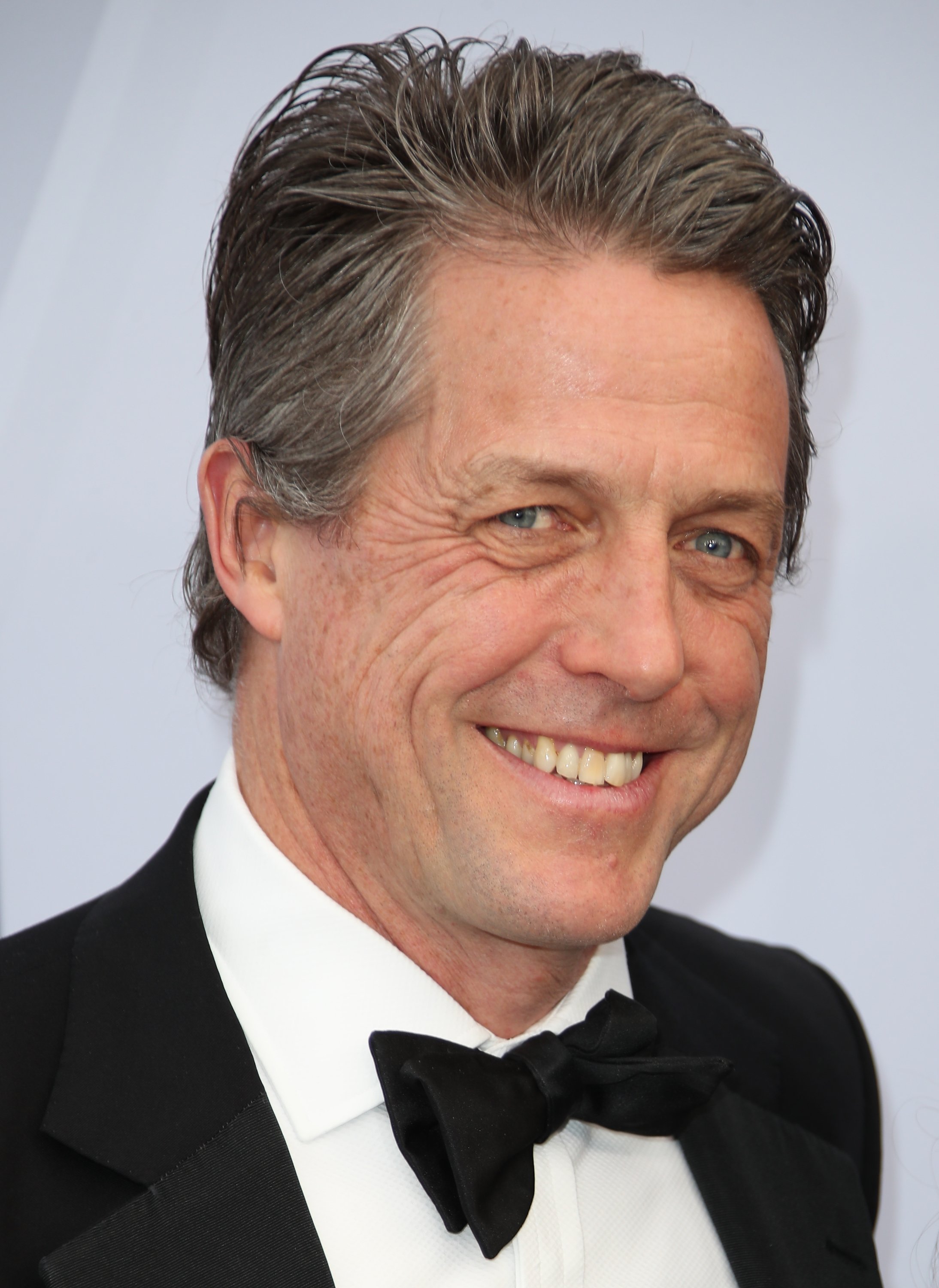 Hugh Grant attending the 25th Annual Screen Actors Guild Awards | Photo: Getty Images