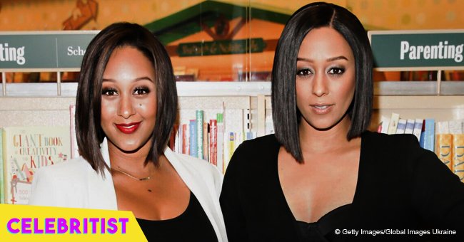 Tia and Tamera Mowry's black mother sizzles in pink swimsuit in throwback picture