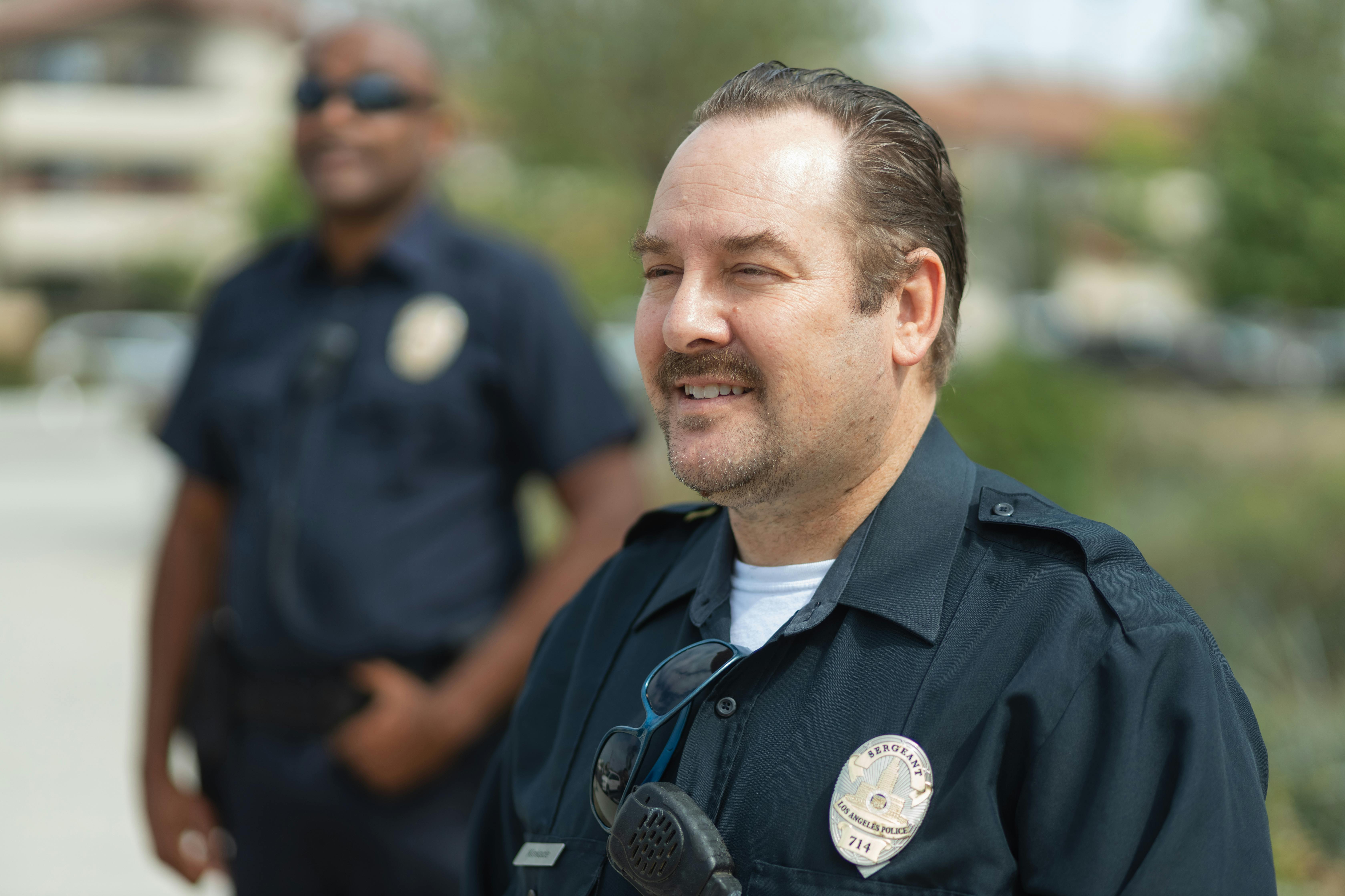 A smiling police officer | Source: Pexels