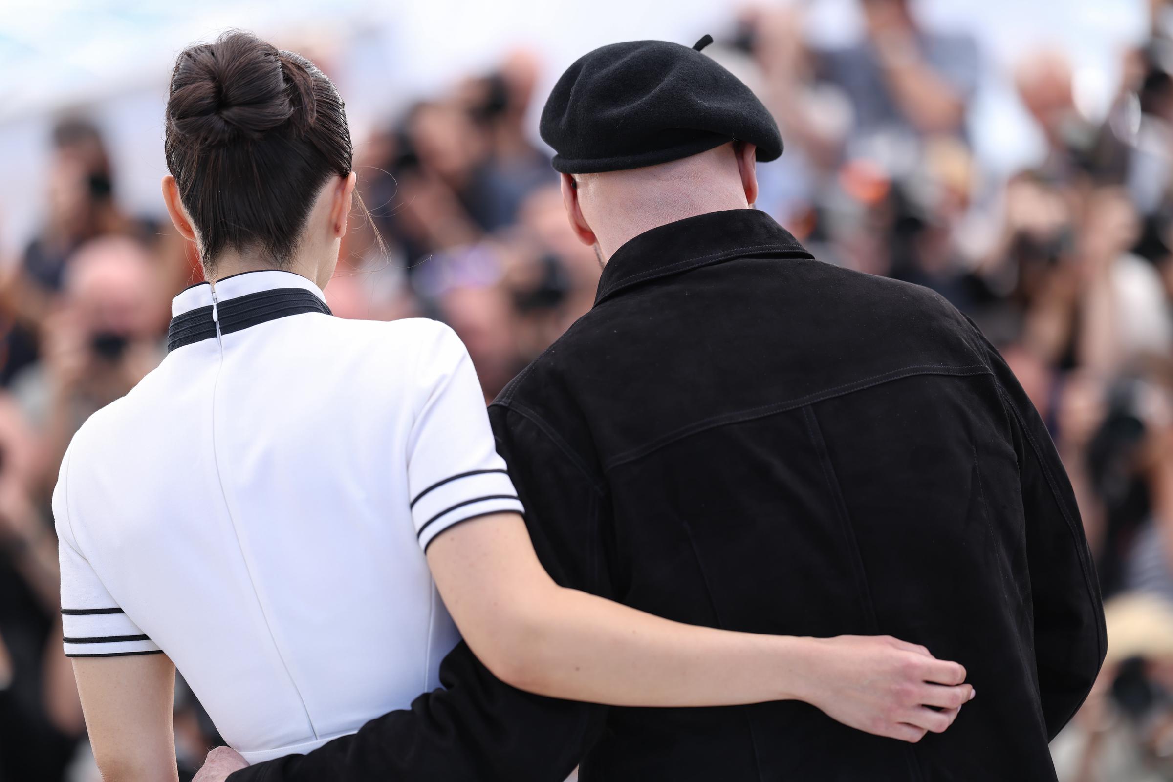 Ella Bleue Travolta and John Travolta pose during the "Propeller One-Way Night Coach" photocall at the annual Cannes Film Festival at Palais des Festivals on May 16, 2026, in Cannes, France | Source: Getty Images
