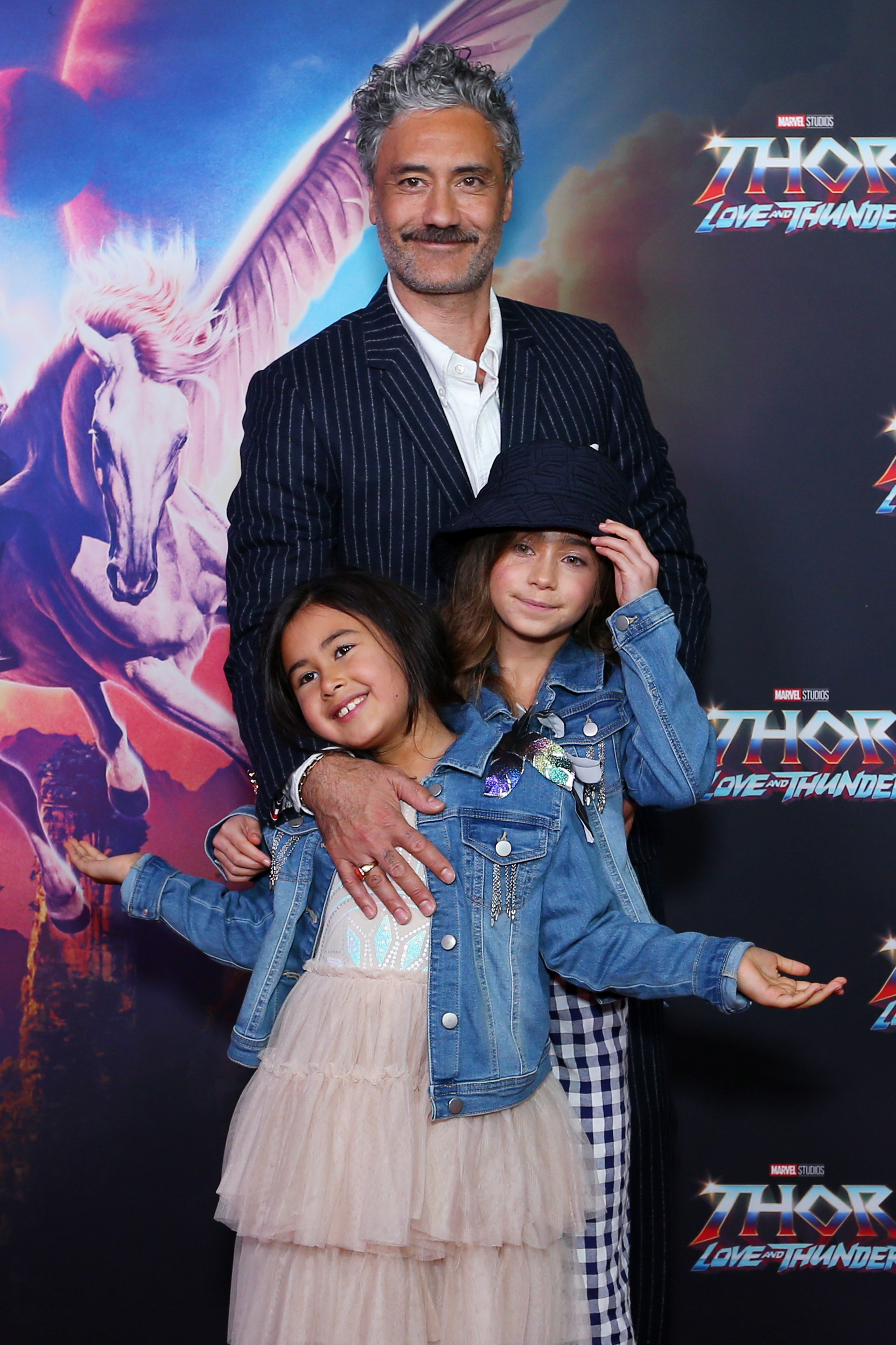 Taika Waititi and daughters Matewa Kiritapu and Te Hinekāhu attend the Sydney premiere of Thor: Love And Thunder at Hoyts Entertainment Quarter on June 27, 2022, in Sydney, Australia. | Source: Getty Images