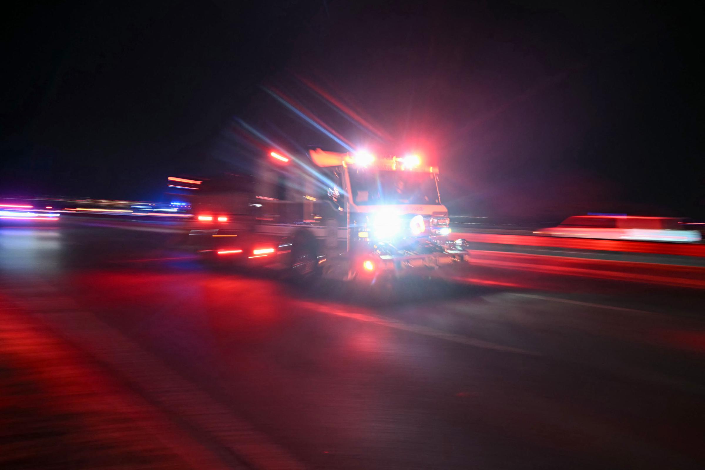 A firetruck heads toward the Potomac River near Reagan National Airport after an air crash in Washington, D.C., on January 29, 2025. | Source: Getty Images