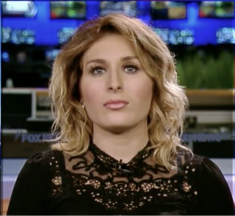 Laura Loomer appears during a television interview in a studio setting, as posted in November 2017 | Source: Youtube/LauraLoomered