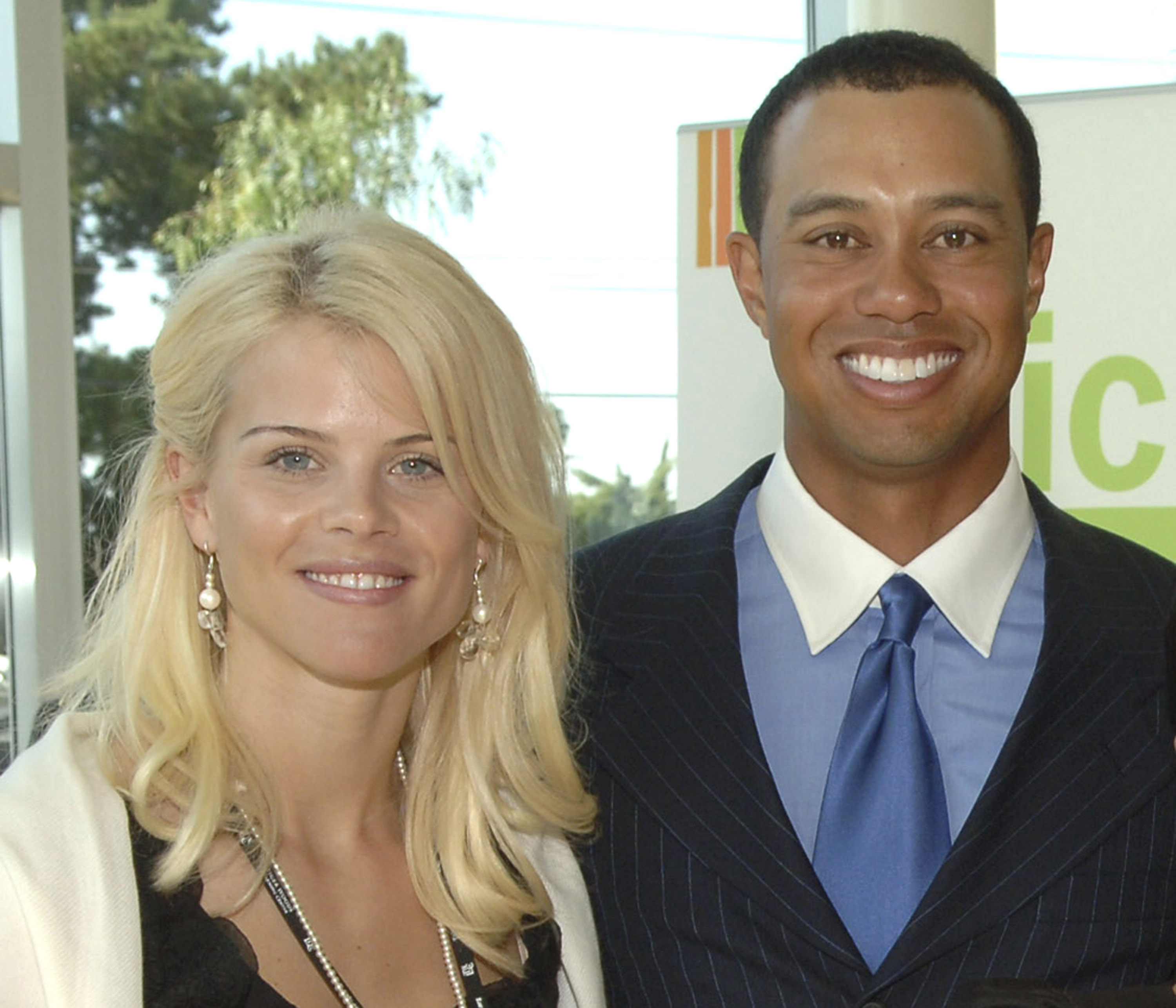 Elin Nordegren and Tiger Woods smile on February 10, 2006. | Source: Getty Images
