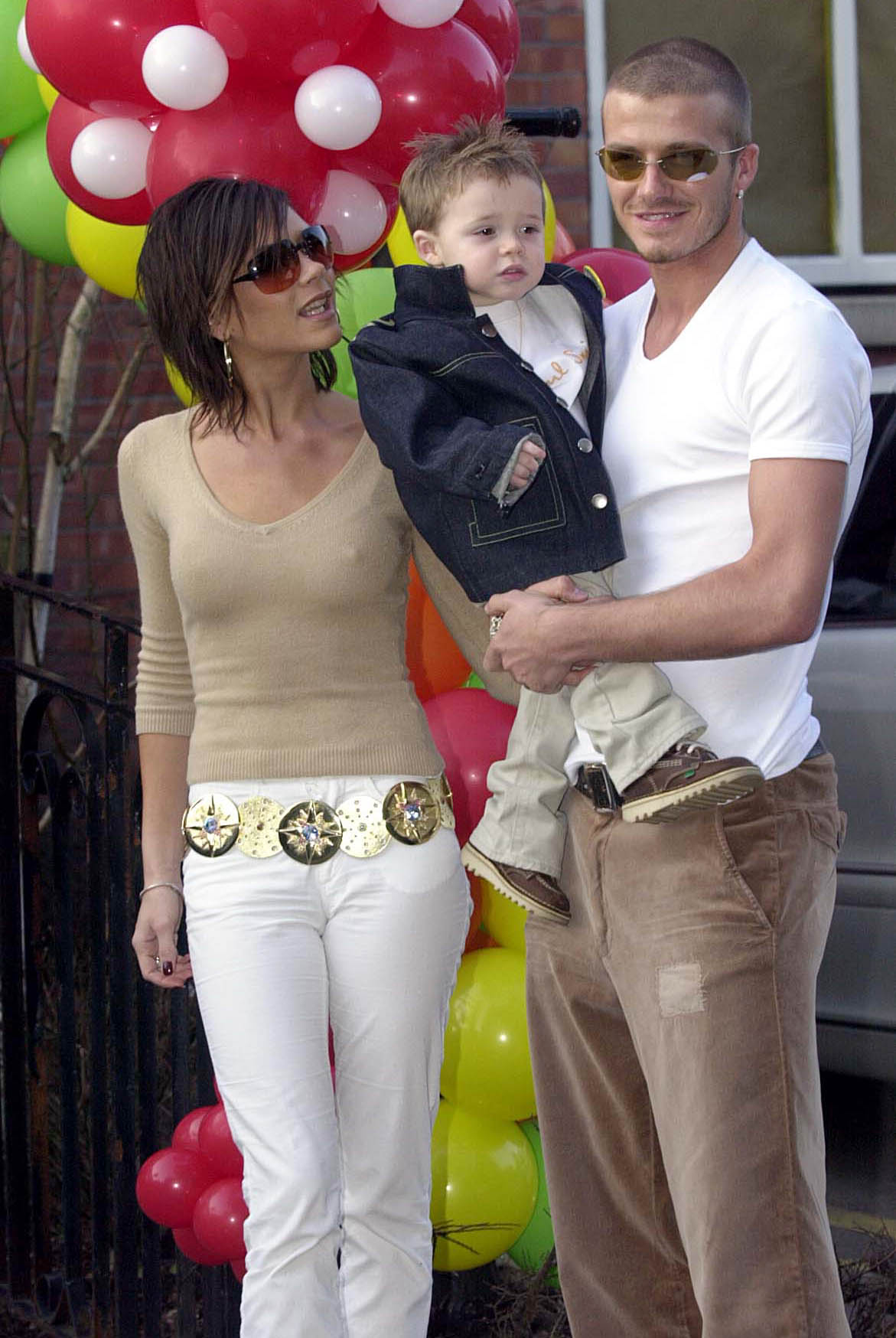 Victoria, Brooklyn, and David Beckham in Alderley Edge, Cheshire, on March 4, 2001. | Source: Getty Images