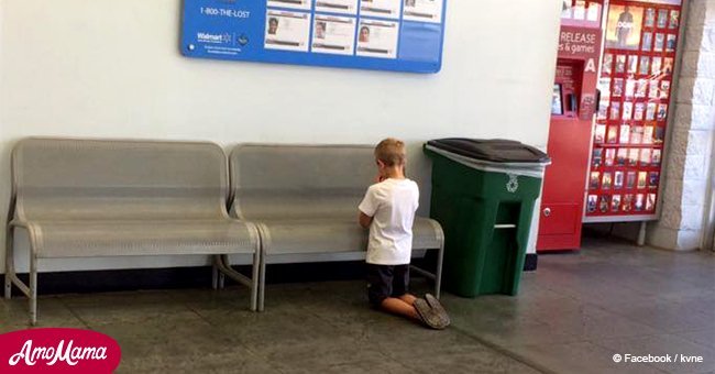 Mom turned around to make sure son was near. But he was kneeling in front of a blue board