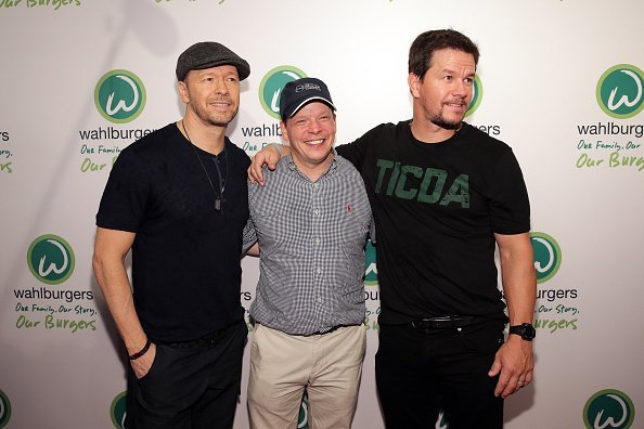 Donnie Wahlberg, Paul Wahlberg and Mark Wahlberg attend the Wahlburgers Coney Island Preview Party on June 23, 2015, in the Brooklyn Borough of New York City. | Source: Getty Images.