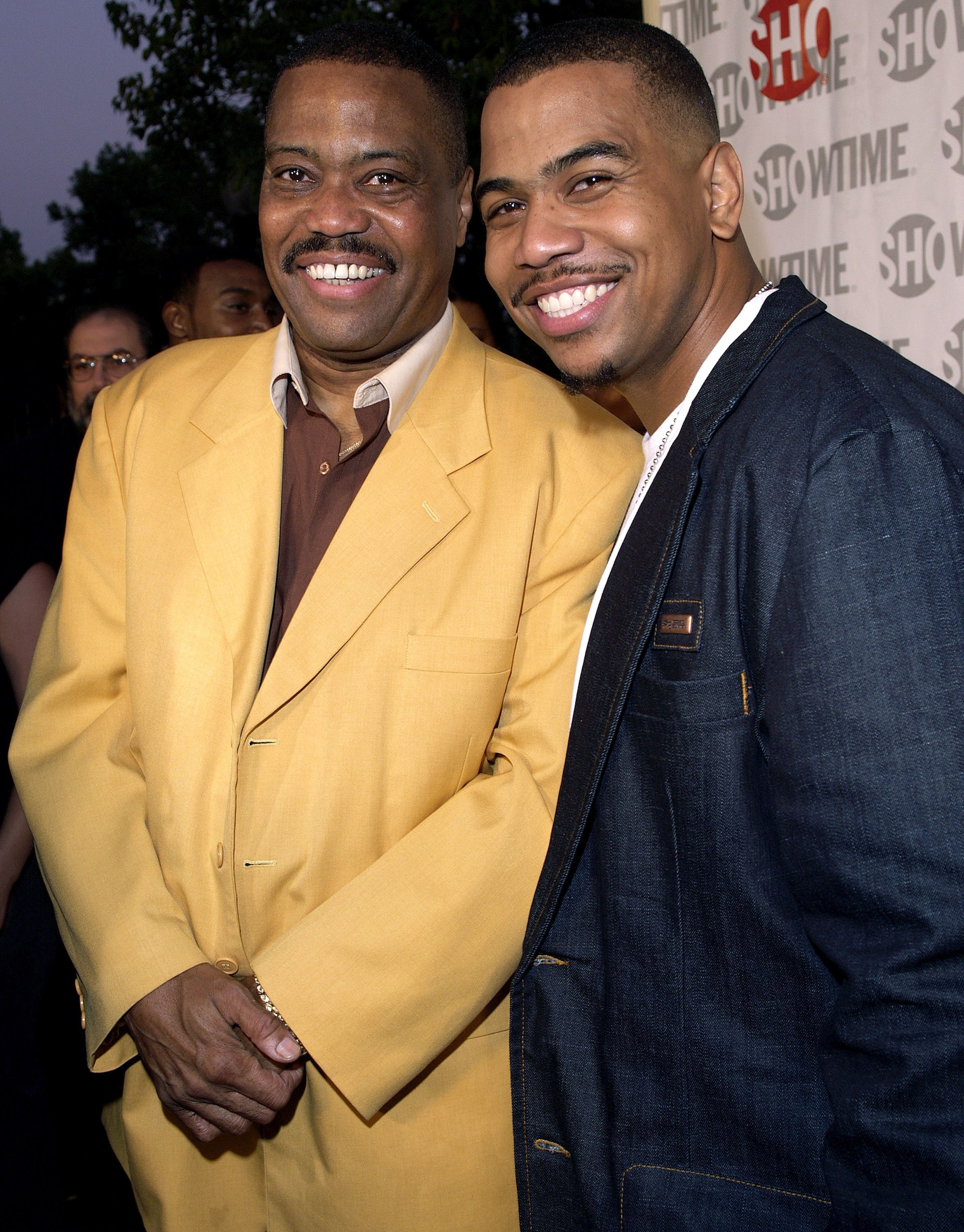 Cuba Gooding Sr. and Omar Gooding smile at the Showtime Presents "Weeds" and "Barbershop" Los Angeles Premiere at Paramount Theater At Paramount Studios in Hollywood, California, United States. | Source: Getty Images
