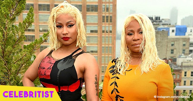 Nicki Minaj's mother rocks beach blonde hair and tight yellow dress at New York Fashion Week