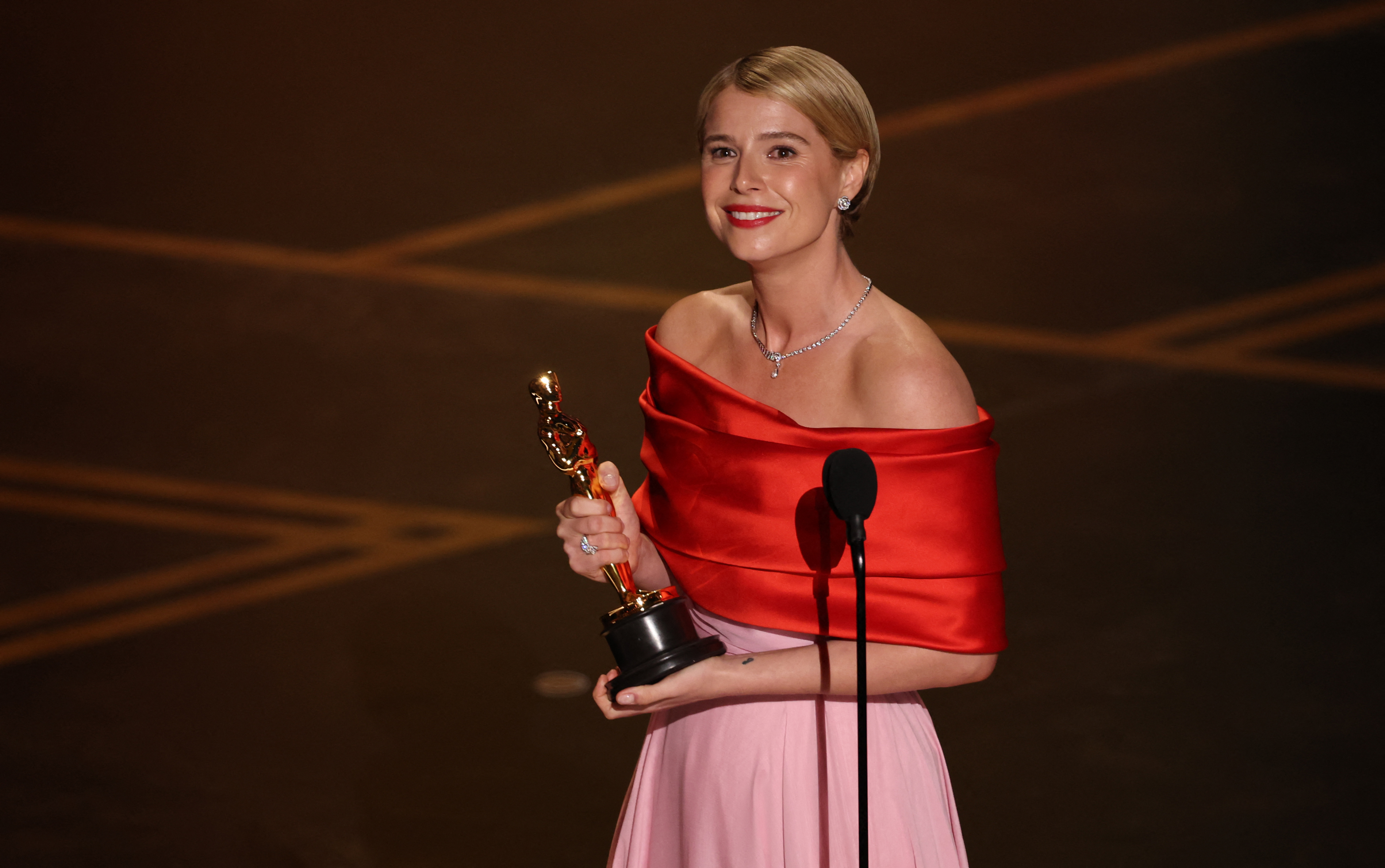 Jessie Buckley accepts the award for Best Actress in a Leading Role for "Hamnet" onstage during the 98th Annual Academy Awards at the Dolby Theatre on 15 March 2026 in Hollywood, California. | Source: Getty Images