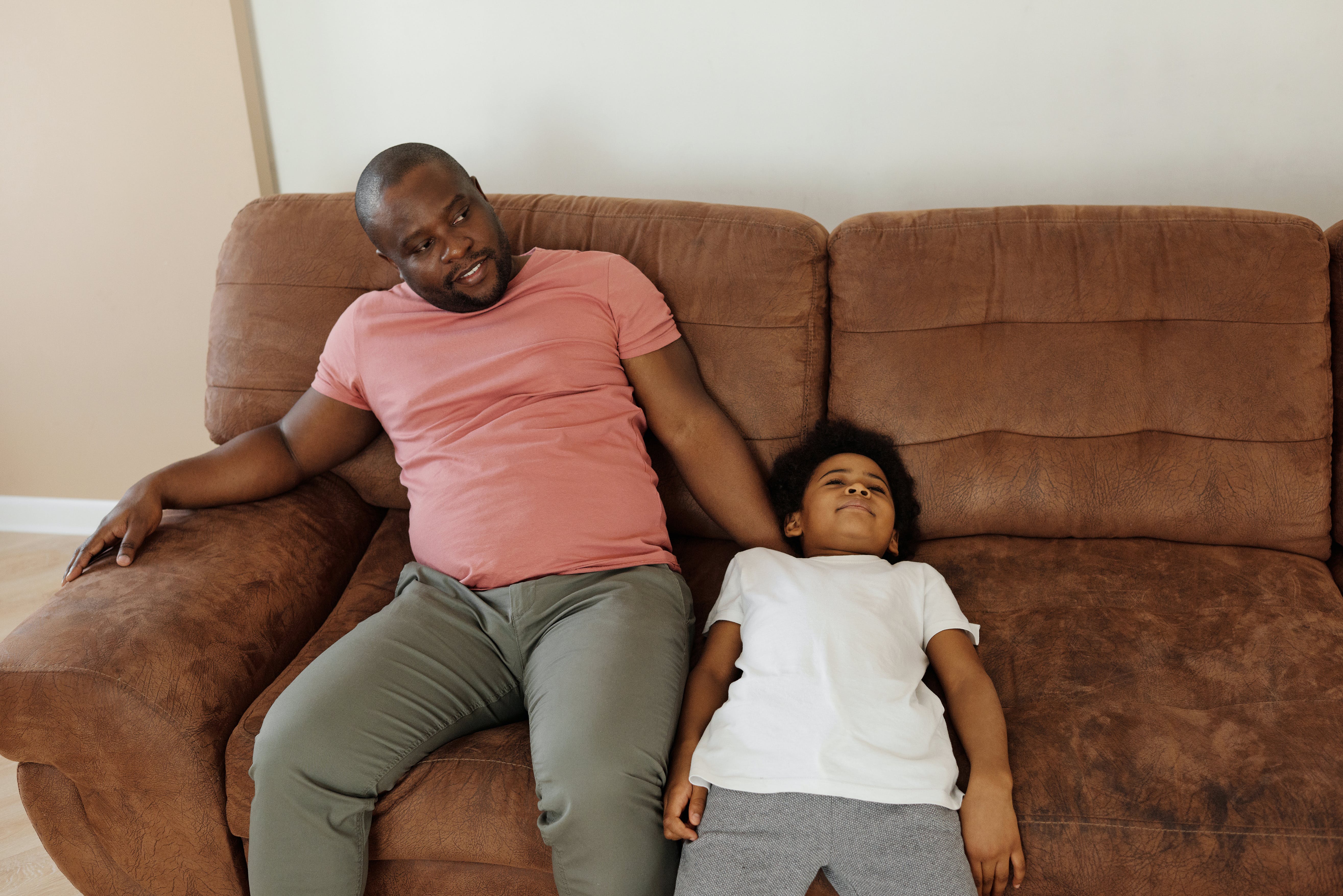 Lazy father and son | Source: Pexels