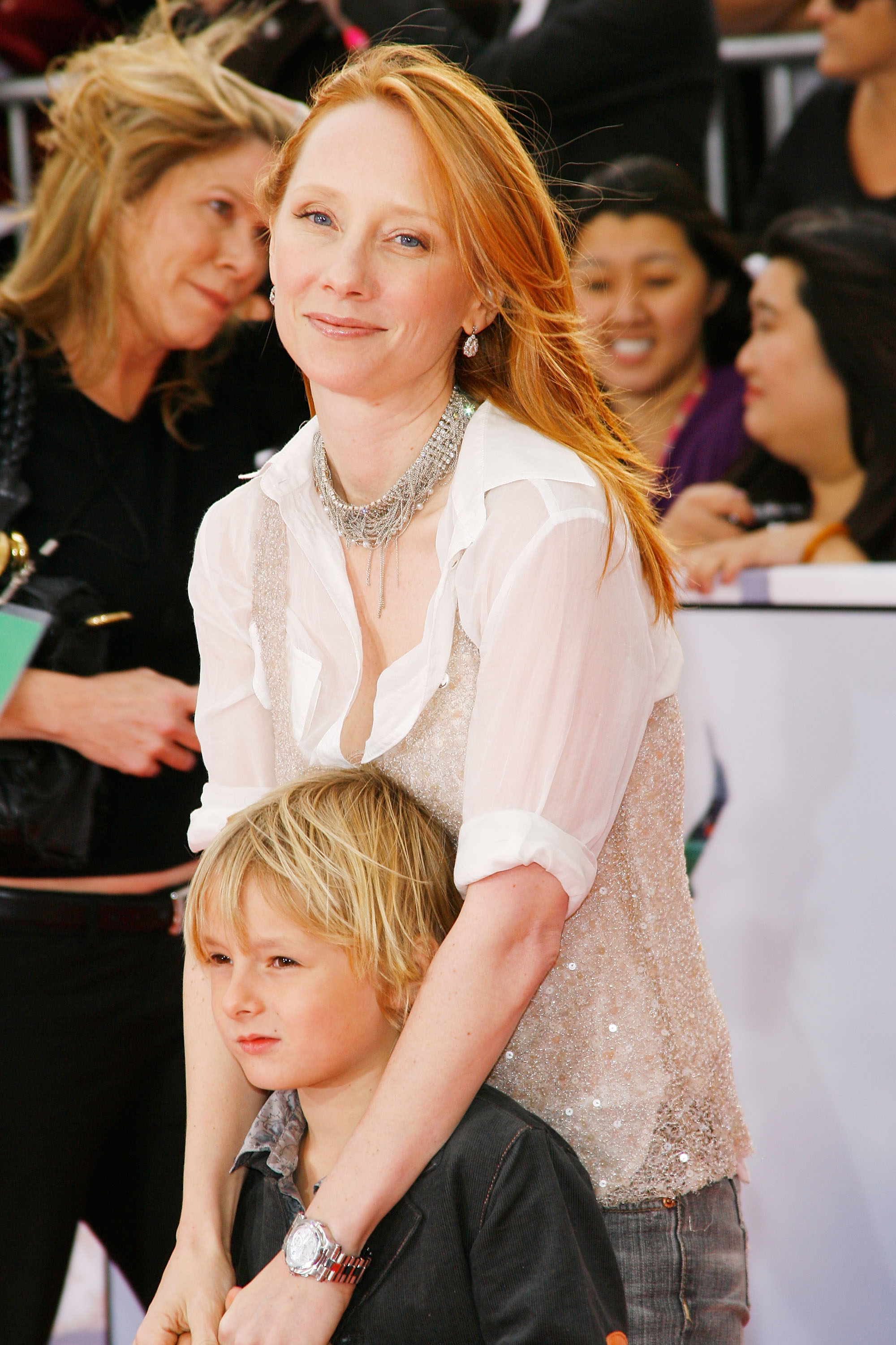 Anne Heche and son, Homer Heche Laffoon arrive to Michael Jackson's "This Is It" - Los Angeles premiere held at Nokia Theatre - L.A. Live on October 27, 2009 in Los Angeles, California. | Source: Getty Images