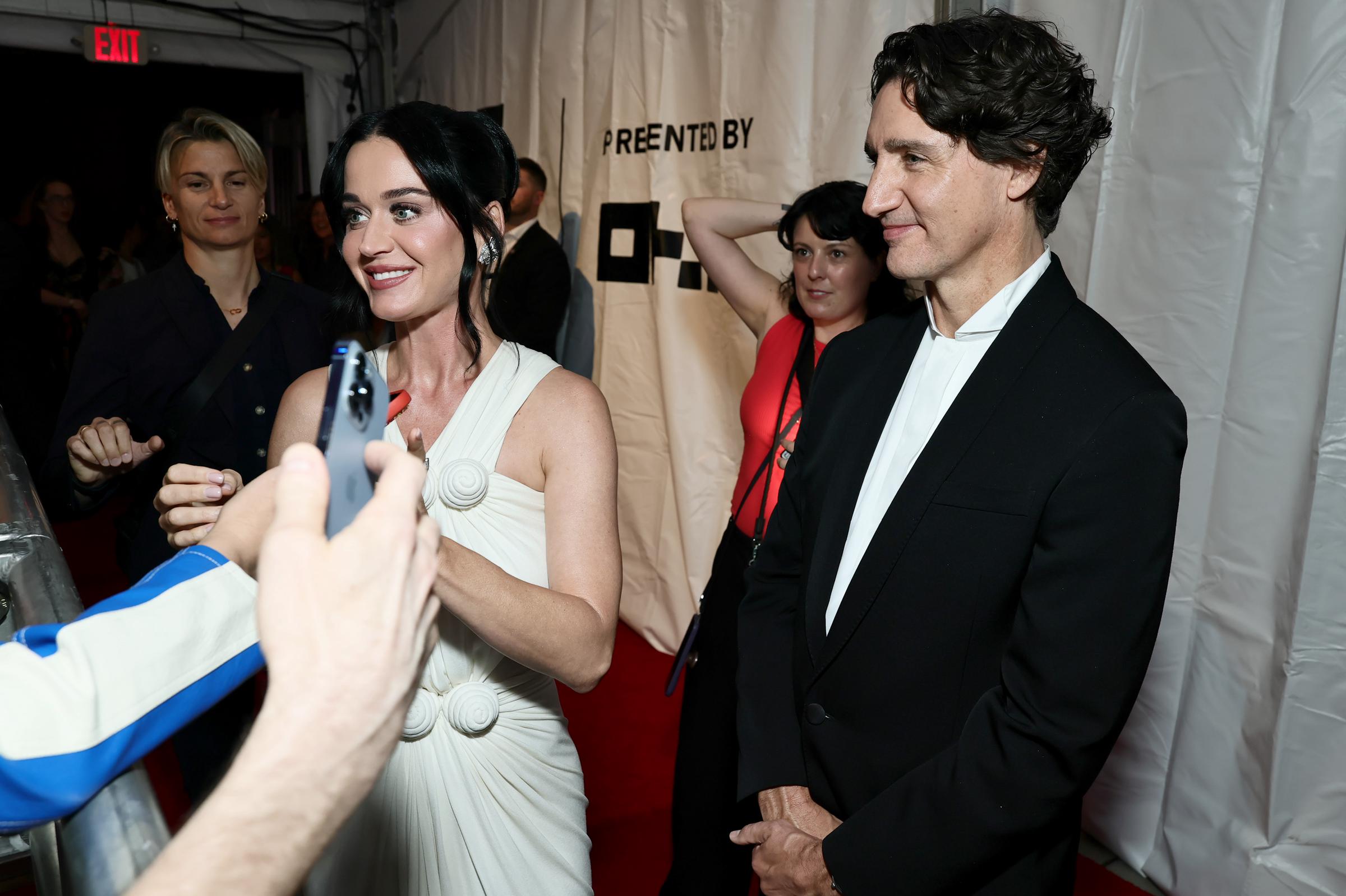 Beyond the posed portraits, Katy Perry and Justin Trudeau seemed comfortable mingling with attendees, offering a glimpse into how they navigated the evening together. | Source: Getty Images