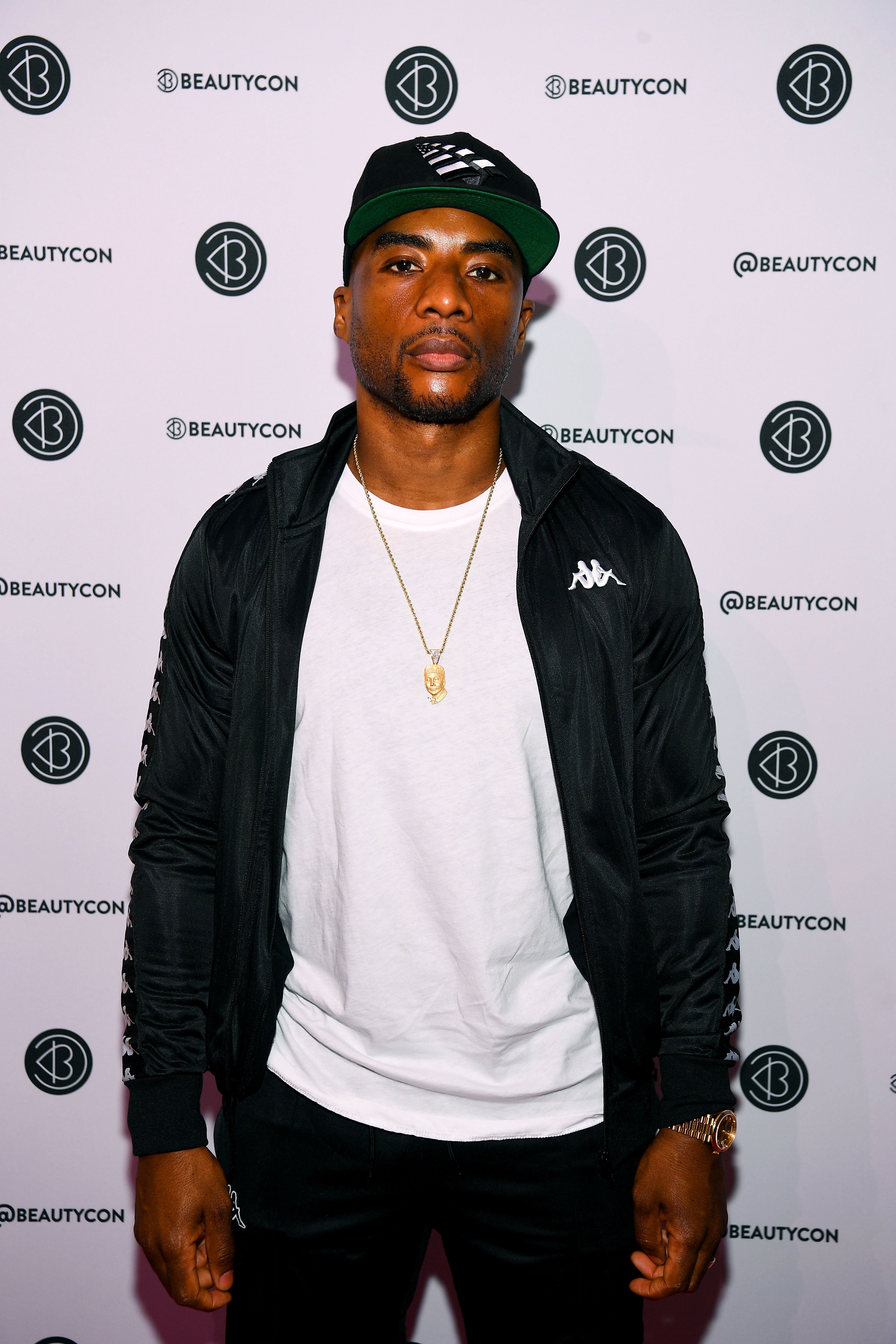 Charlamagne Tha God poses backstage at Beautycon Festival New York 2019 on April 07, 2019 in New York City | Photo: Getty Images