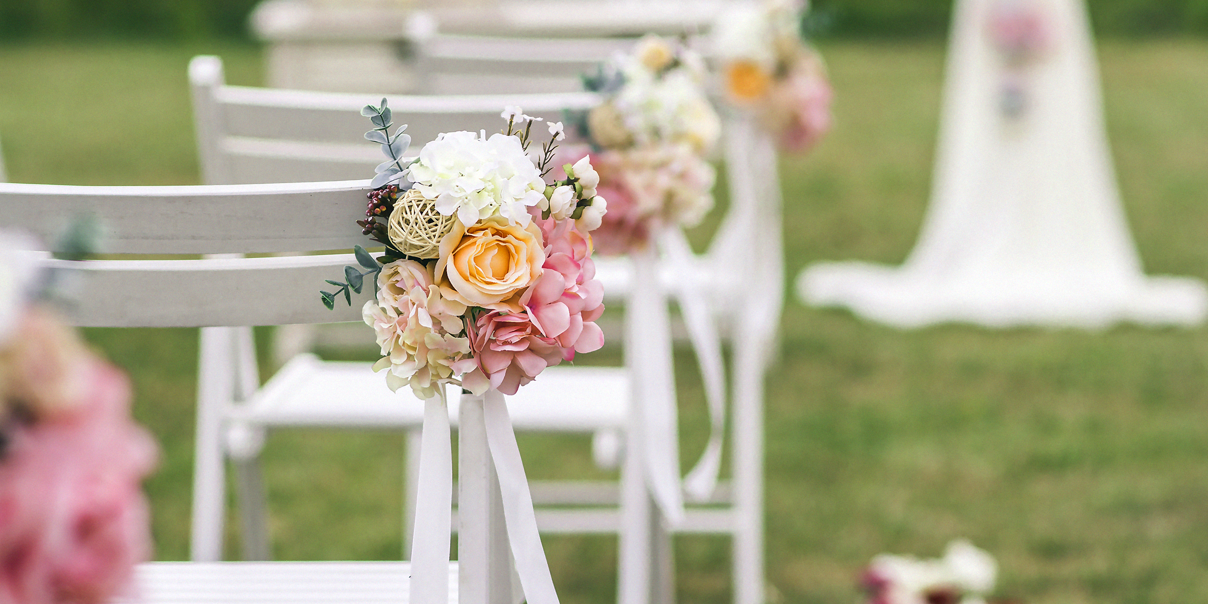 Chair with flowers on wedding | Shutterstock
