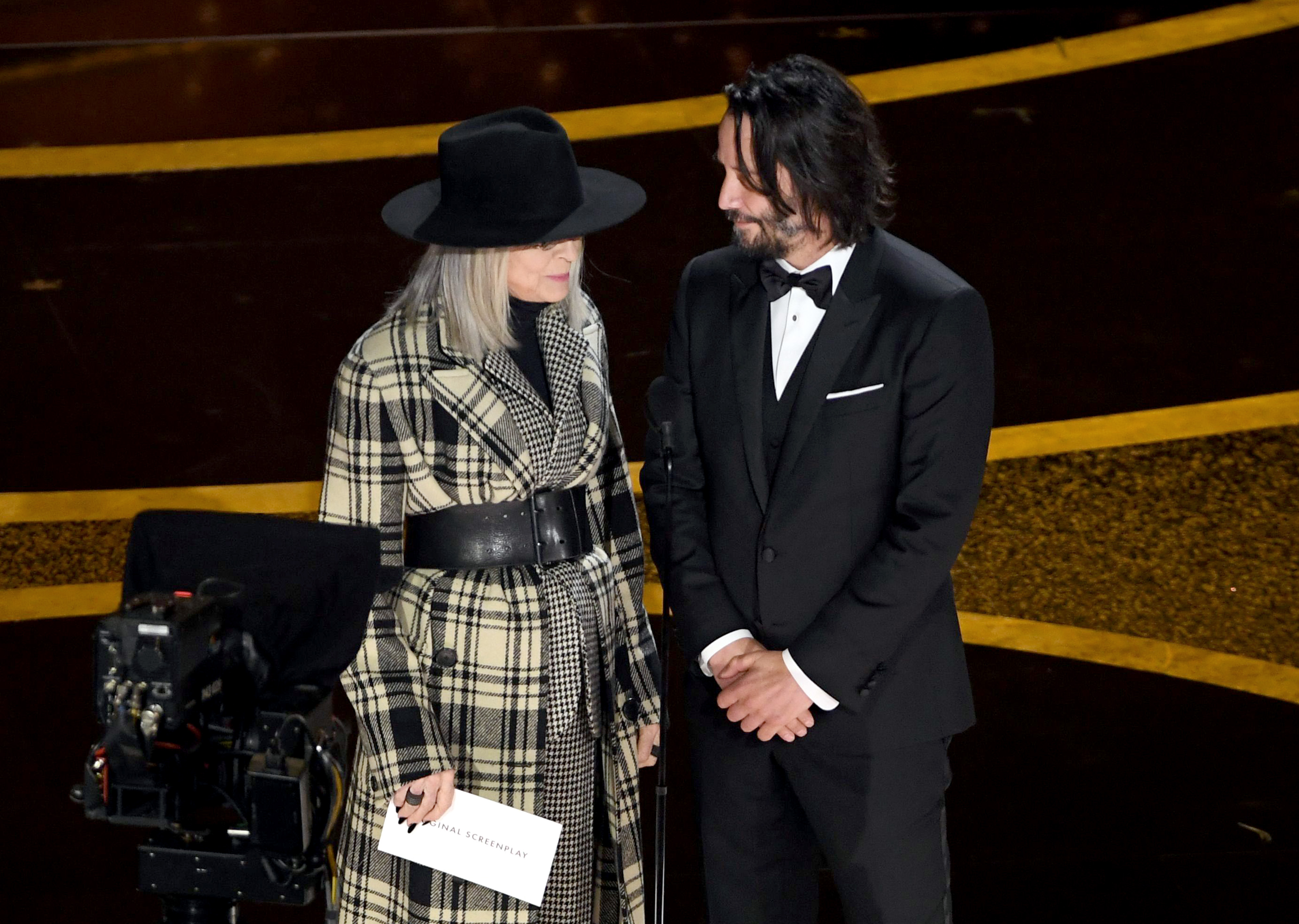 Diane Keaton and Keanu Reeves speak onstage during the 92nd Annual Academy Awards on February 9, 2020 | Source: Getty Images