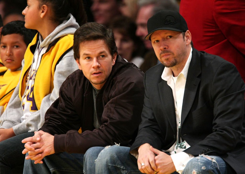 Mark and Donnie Wahlberg attend the Los Angeles Lakers vs Boston Celtics game at the Staples Center on December 30, 2007 in Los Angeles, California. | Photo: Getty Images