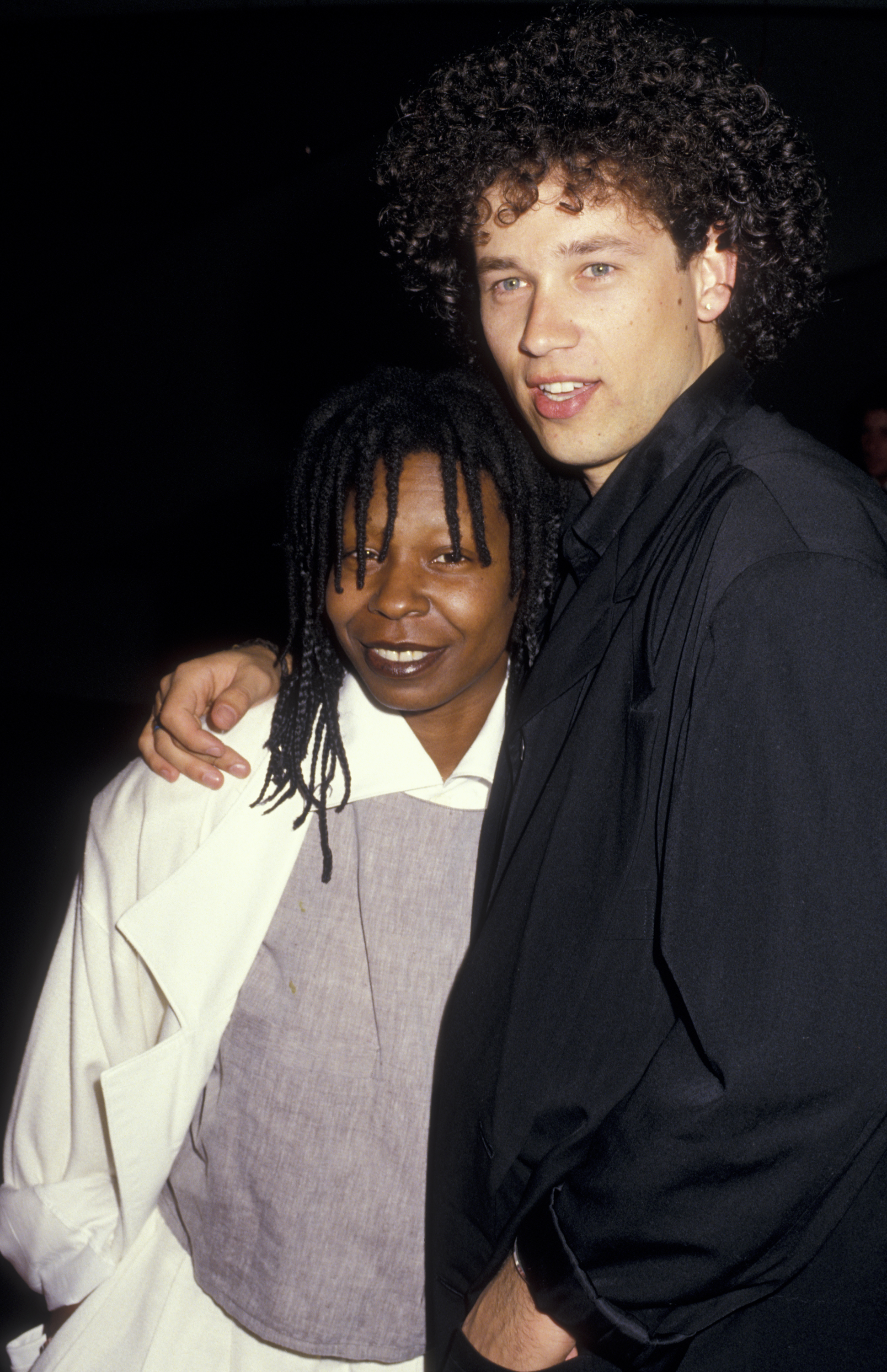 Whoopi Goldberg and David Claessen attend the "Starlight Wishes, Musical Memories, Valentine Dreams" Starlight Children's Foundation Benefit at the Bonaventure Hotel on February 14, 1987, in Los Angeles, California. | Source: Getty Images