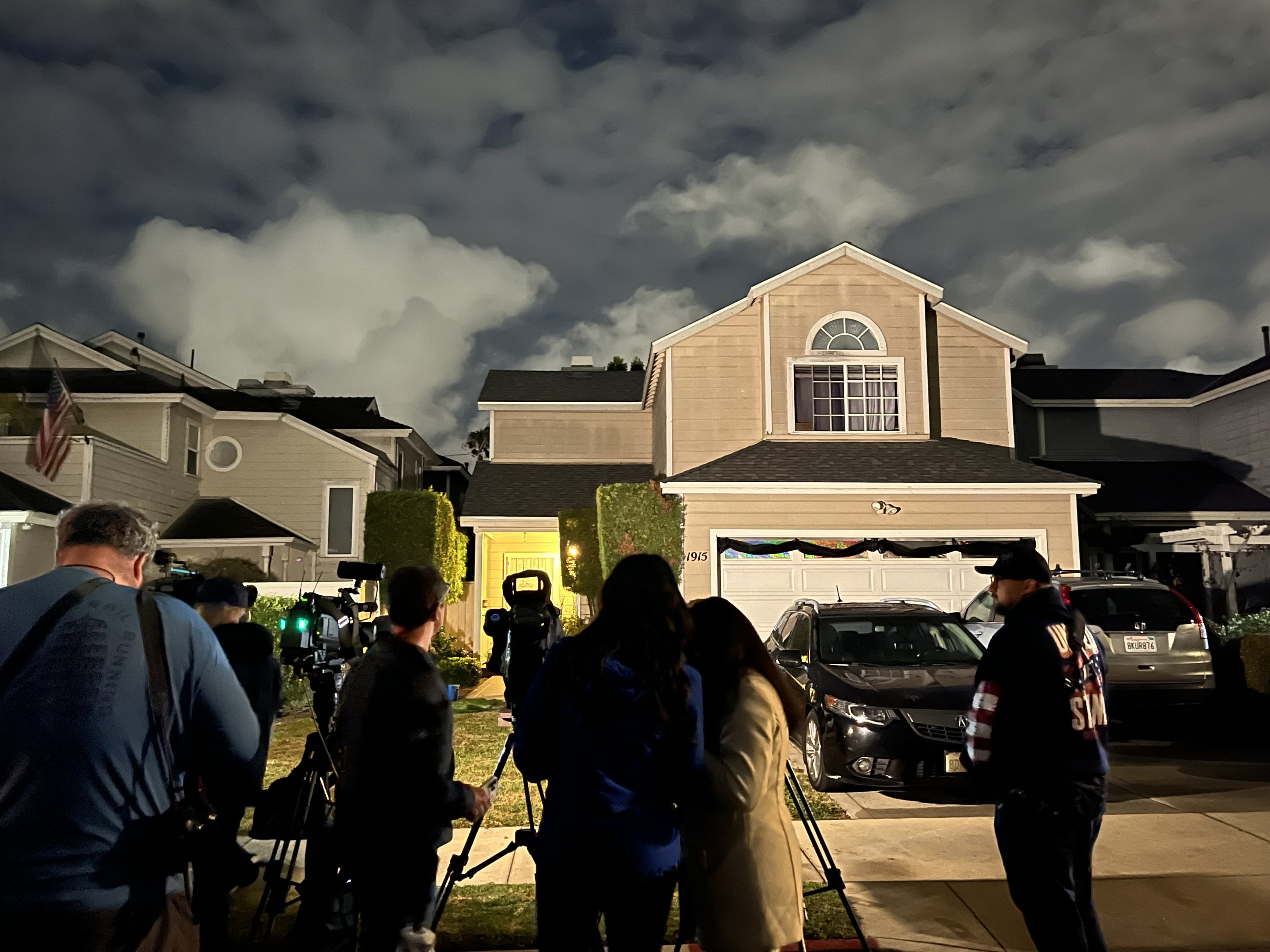Media gather in front of a house connected to shooting suspect Cole Tomas Allen in Torrance, California, on April 25, 2026 | Source: Getty Images