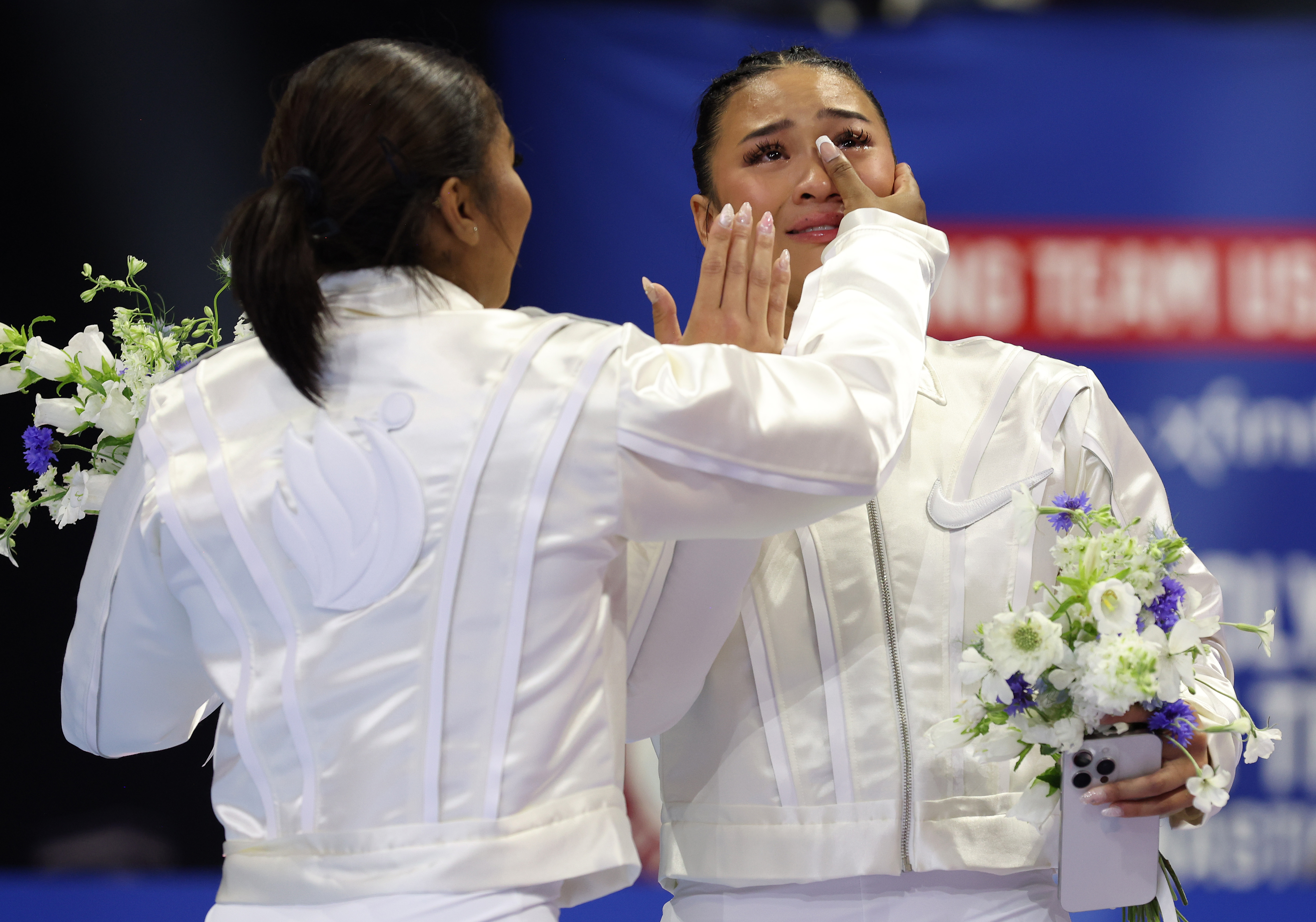 Jordan Chiles and Suni Lee celebrate after being selected for the US Olympic Women's Gymnastics Team at the US Olympic Team Gymnastics Trials on June 30, 2024, in Minneapolis, Minnesota | Source: Getty Images