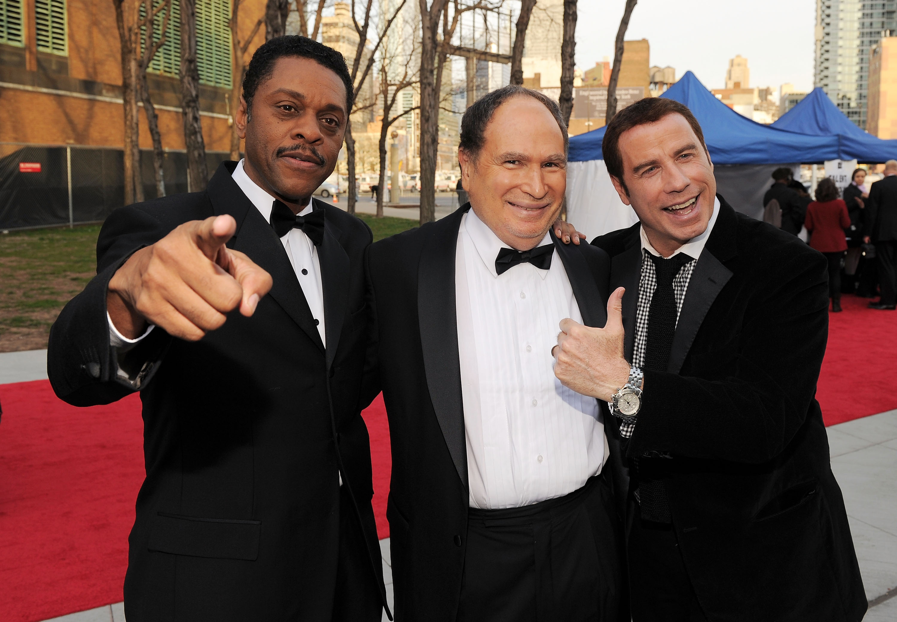 Lawrence Hilton-Jacobs, Gabe Kaplan, and John Travolta in New York City on April 10, 2011 | Source: Getty Images