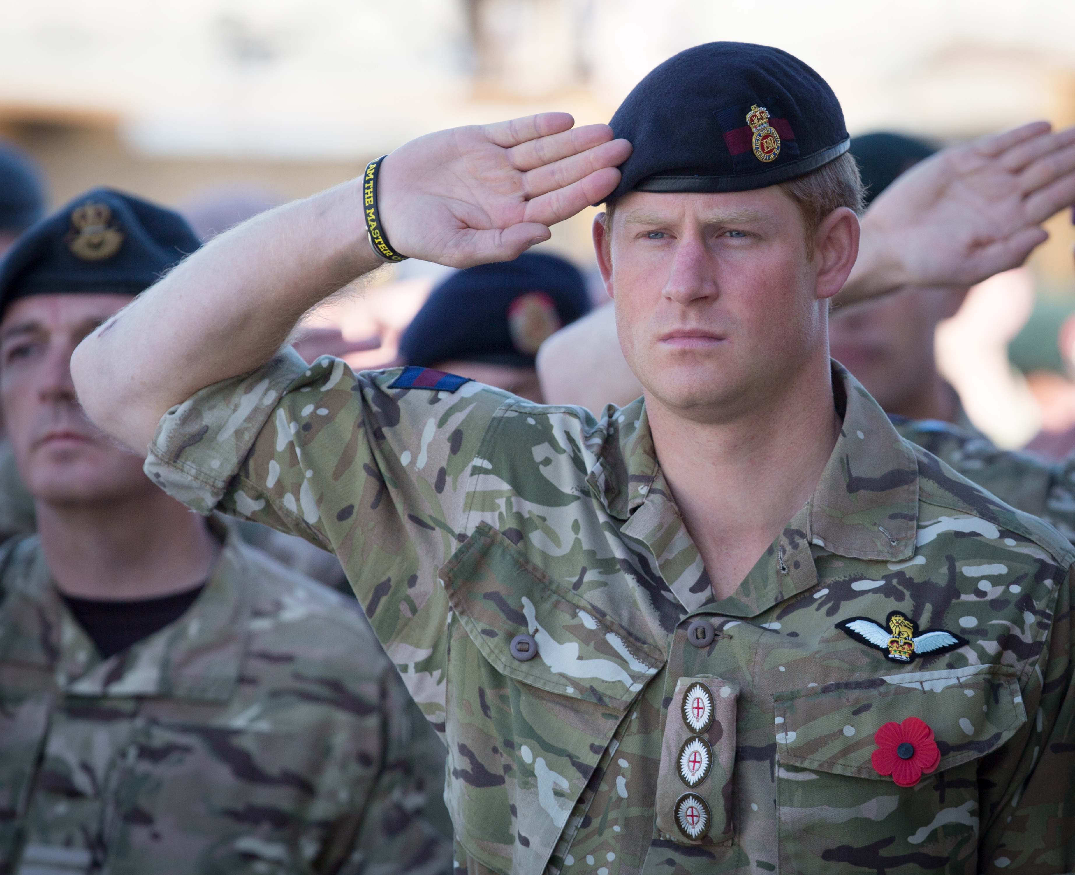 Prince Harry gathered with other British troops for a Remembrance Sunday service at Kandahar Airfield in Kandahar, Afghanistan on November 9, 2014. | Source: Getty Images