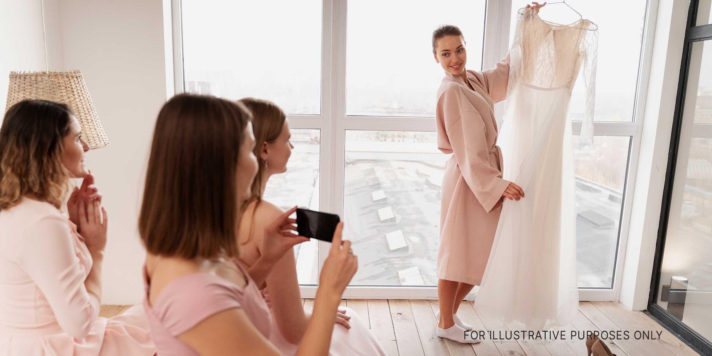A bunch of women looking at another one holding up a wedding dress | Source: Freepik.com