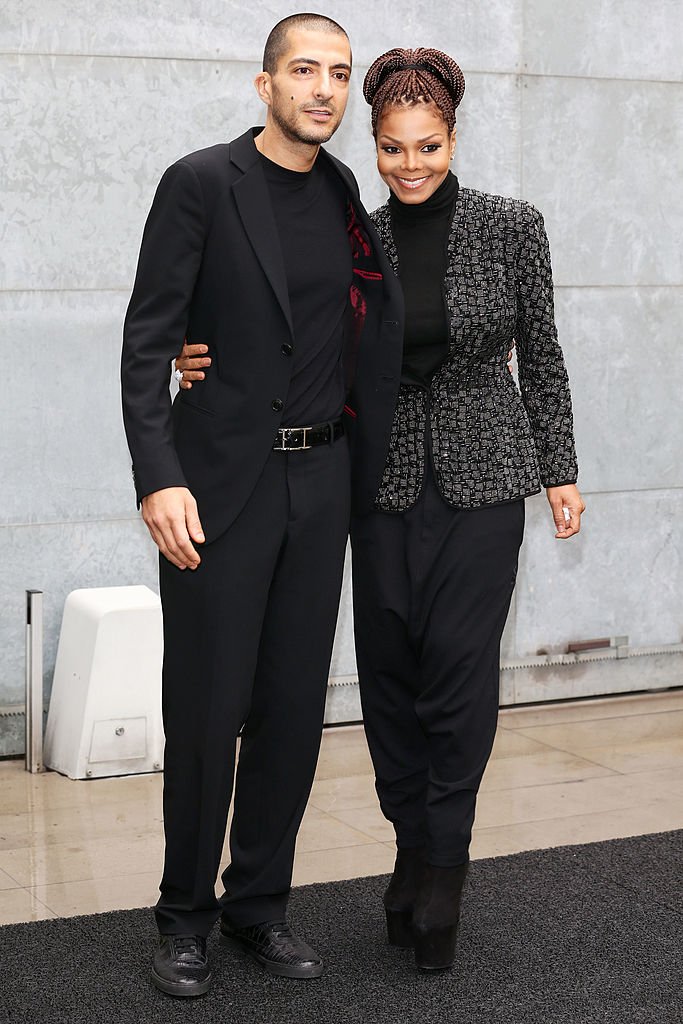 Wissam Al Mana und Janet Jackson bei der Modenschau von Giorgio Armani am 25. Februar 2013 in Mailand | Quelle: Getty Images