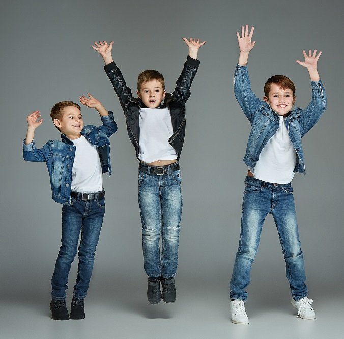 Three boys jumping. | Photo: Freepik