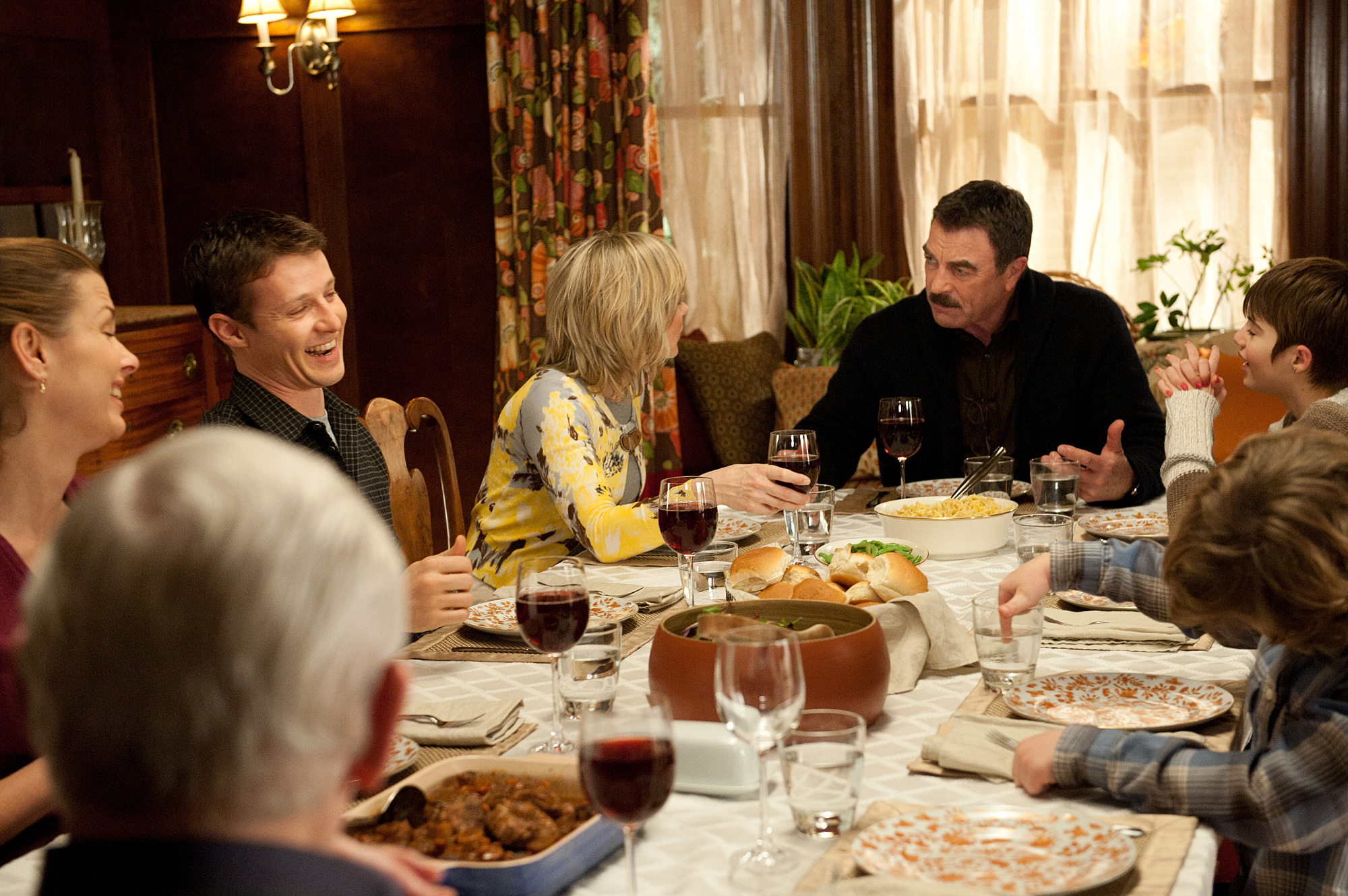 "Blue Bloods," a show enjoyed by people of all ages, featuring some of the best TV stars in the country. In this scene, Bridget Moynahan, Will Estes, Amy Carlson, Tom Selleck, and Sami Gayle sit at a table for Sunday dinner on an episode that aired on February 9, 2011 | Source: Getty Images