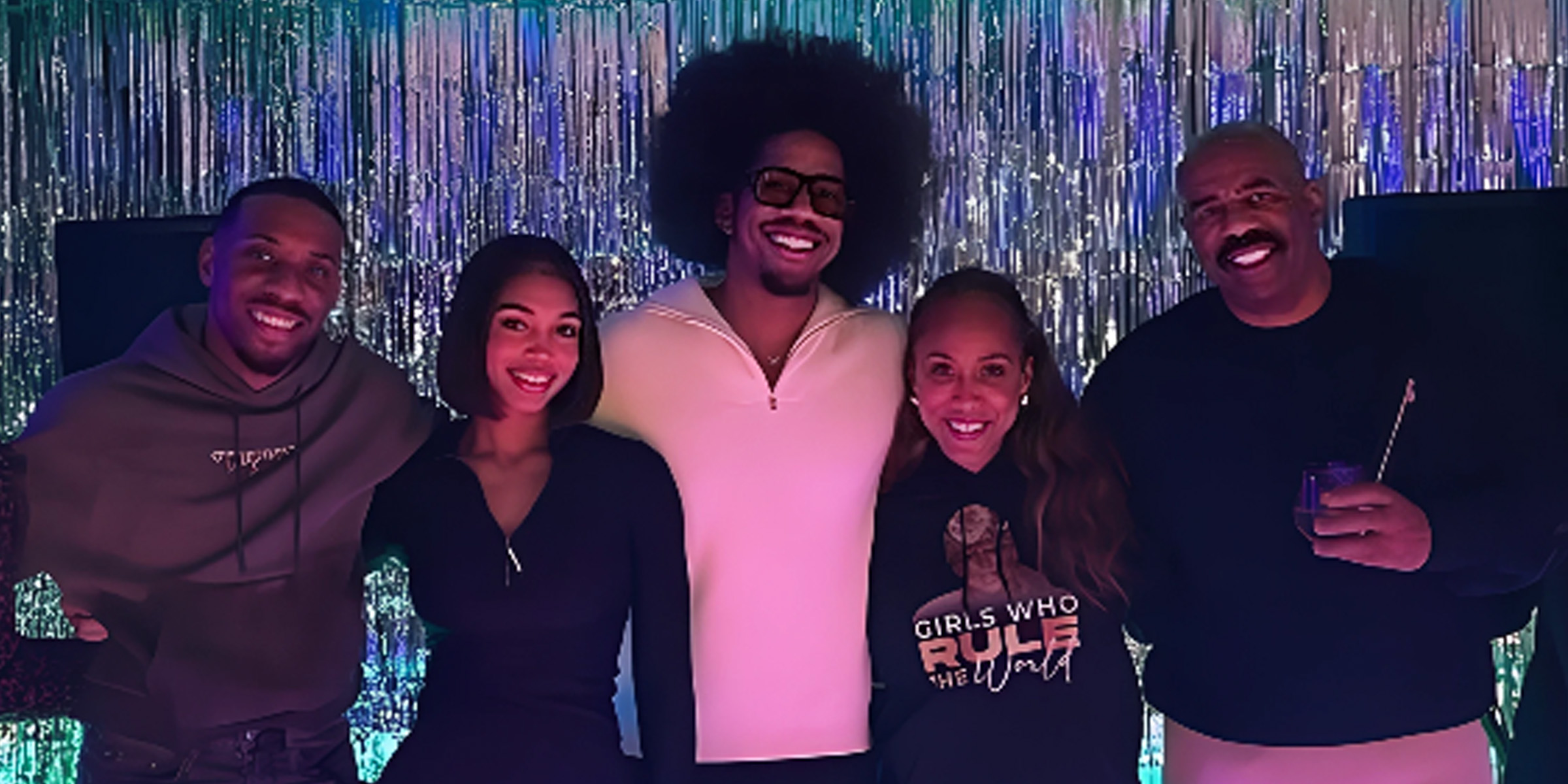Steve and Lori Harvey with other people | Source: Instagram/iamsteveharveytv