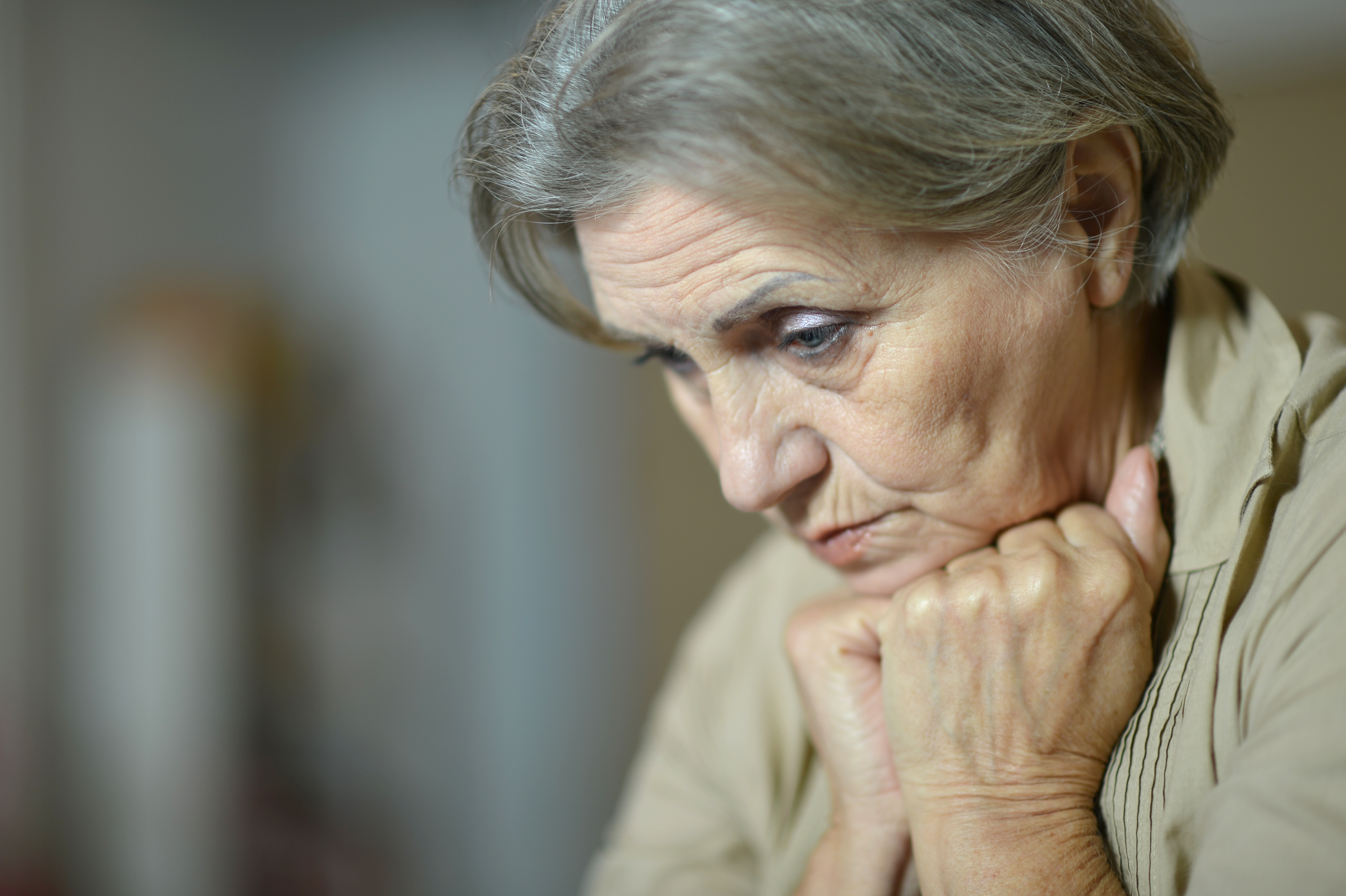 Sad aged woman | Source: Shutterstock