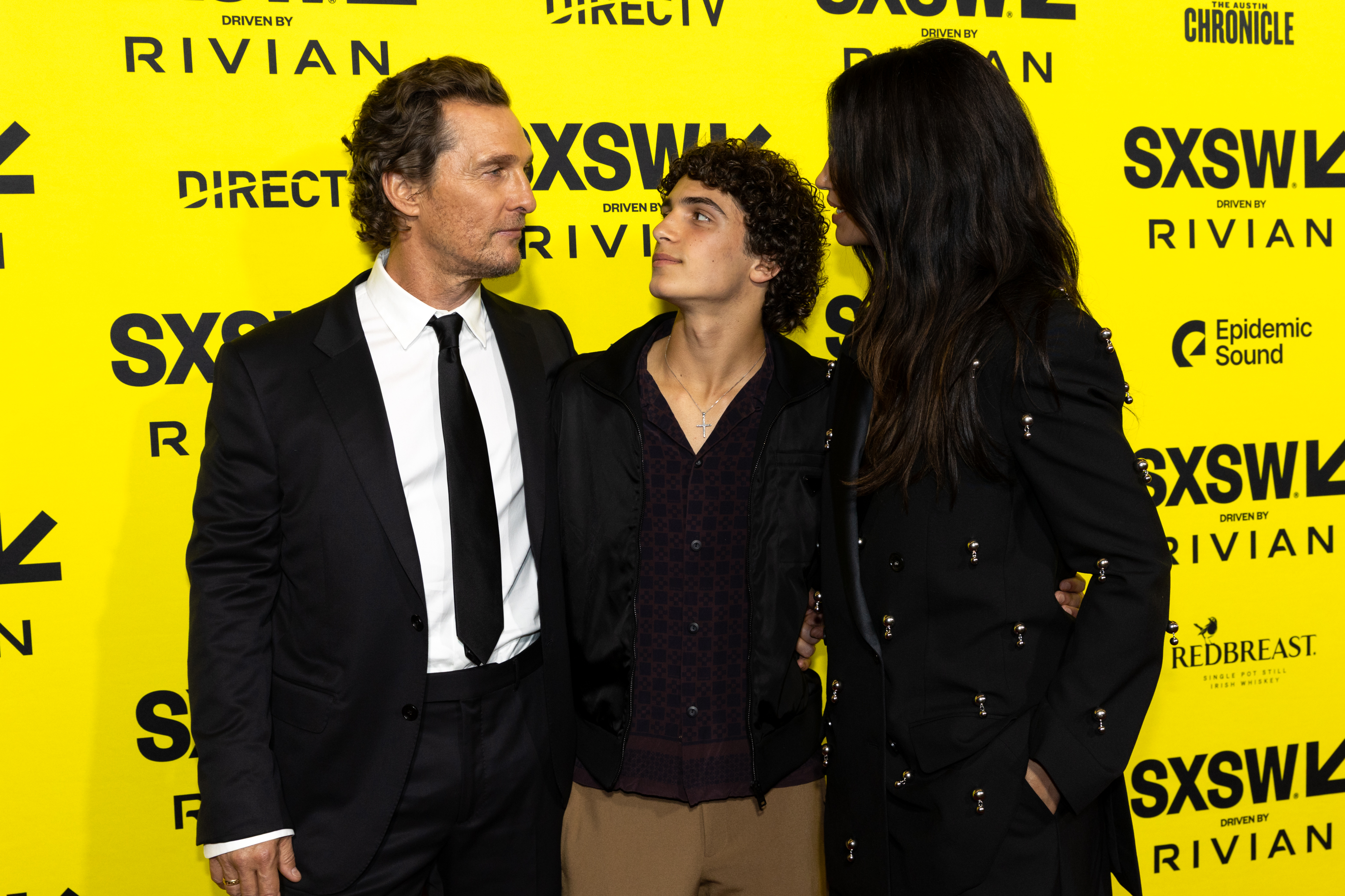 Matthew McConaughey, Levi McConaughey, and Camila Alves McConaughey are pictured at "The Rivals of Amziah King" premiere on March 10, 2025, in Austin, Texas | Source: Getty Images