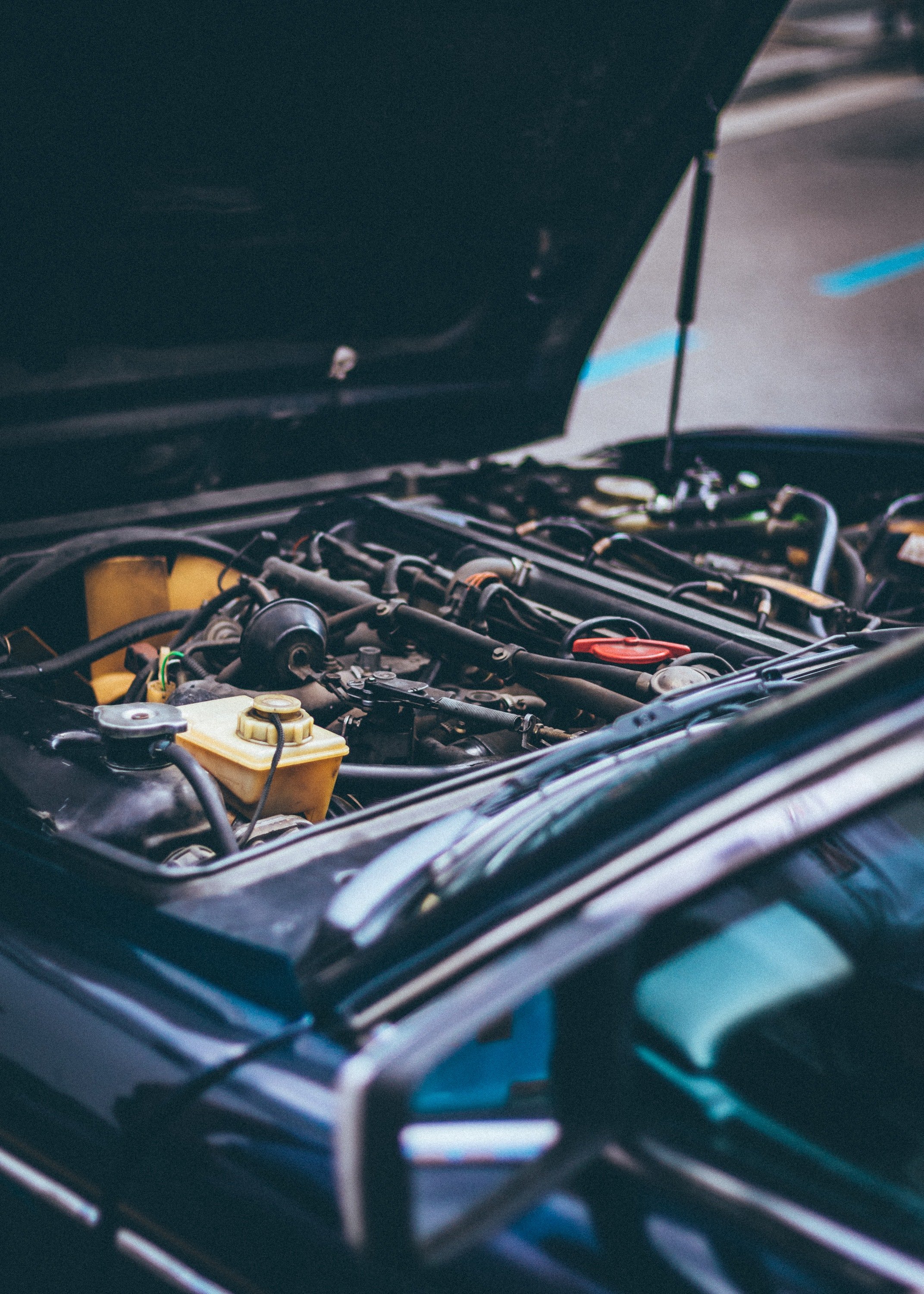 A close-up of a car engine. | Photo: Pexels/George Sultan